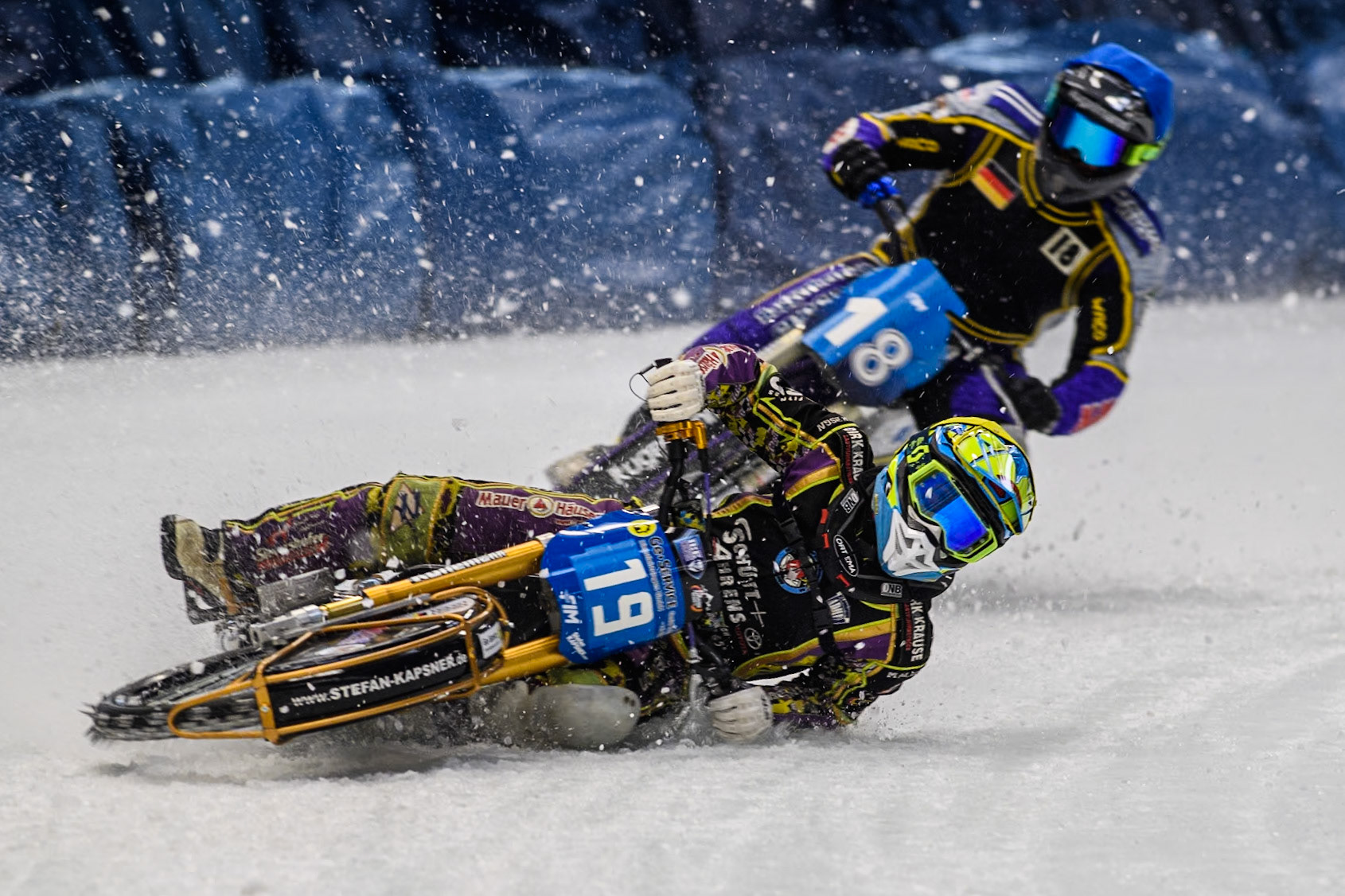 German Reserve Maximillian Neidermaier (19) gets into difficulty in front of Germany's Christoph Kirchner (18) during the FIM Ice Speedway Gladiators World Championship Final 2 at the Max-Aicher-Arena, Inzell on Sunday 24 March 2024. (Photo: Ian Charles | MI News)