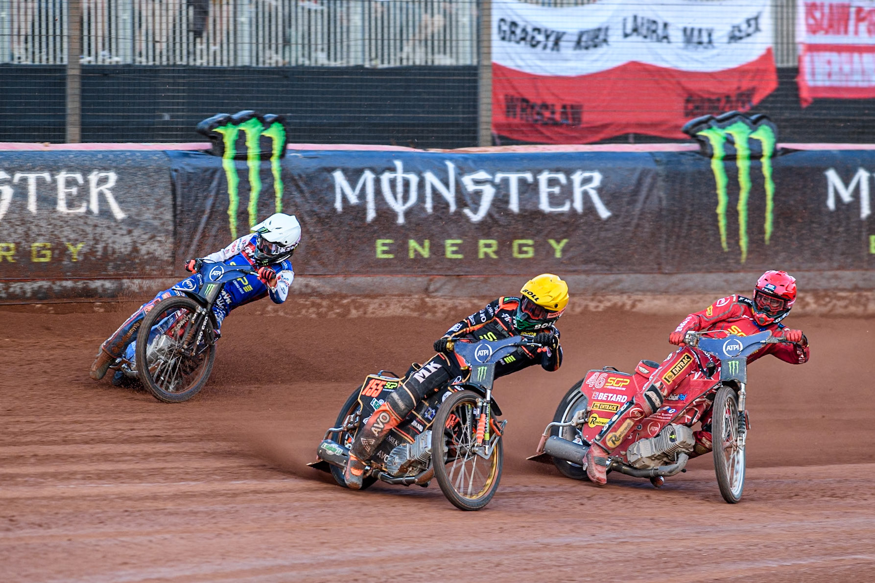 Last Chance Qualifier 2: Mikkel Michelsen (155) of Denmark in Yellow leading Max Fricke (46) of Australia in Red and Dan Bewley (99) of Great Britain in White during the ATPI FIM Speedway Grand Prix Round 5 at the National Speedway Stadium, Manchester, on Saturday 14th June 2025. (Photo: Ian Charles | MI News)