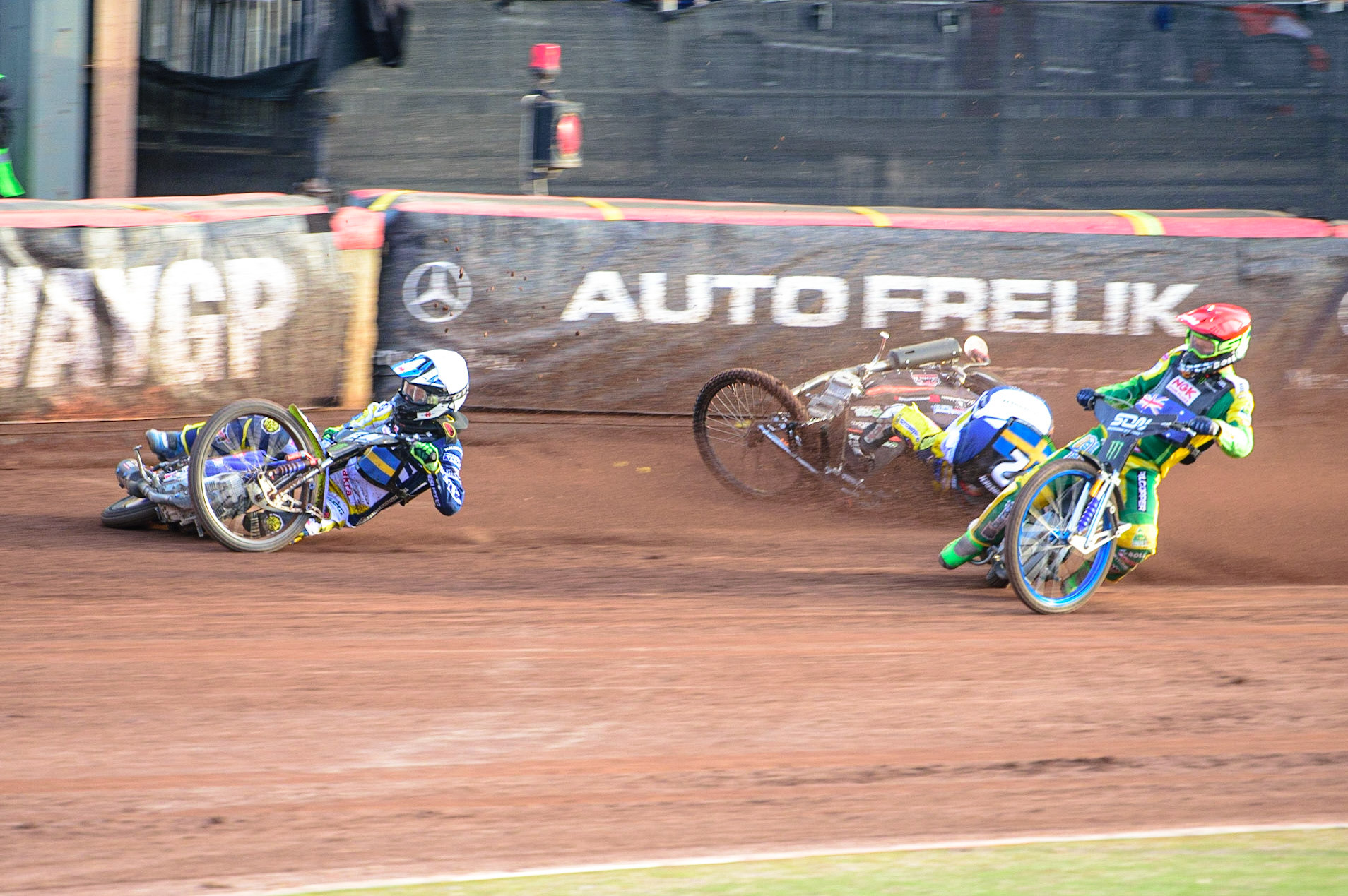 MANCHESTER, UK. OCT 16TH Pontus Aspgren of Sweden (White) slides off as Jacob Thorsell of Sweden hits the airfence during the Monster Energy FIM Speedway of Nations at the National Speedway Stadium, Manchester on Saturday  16th October 2021. (Credit: Ian Charles | MI News)