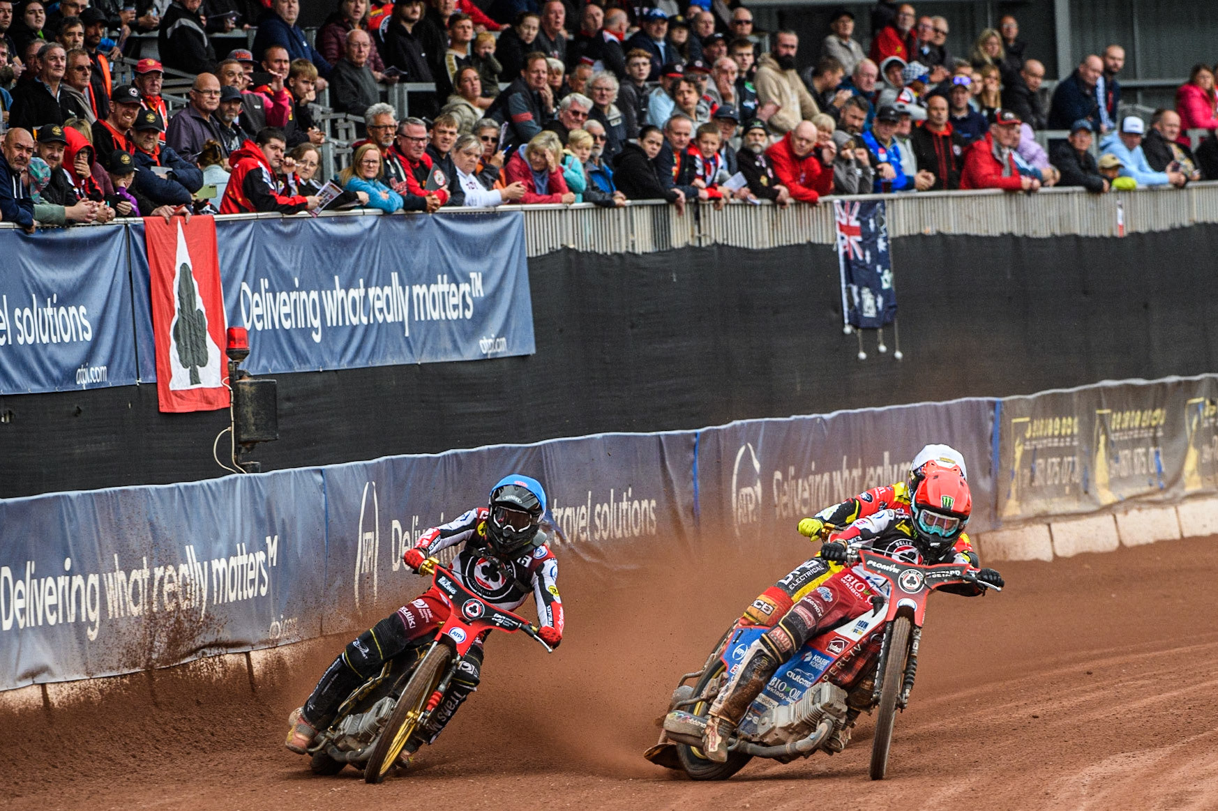 Dan Bewley (Red) and Norick Blodorn (Blue) lead Richie Worrall (White) during the Sports Insure Premiership match between Belle Vue Aces and Leicester Lions at the National Speedway Stadium, Manchester on Monday 28th August 2023. (Photo: Ian Charles | MI News)