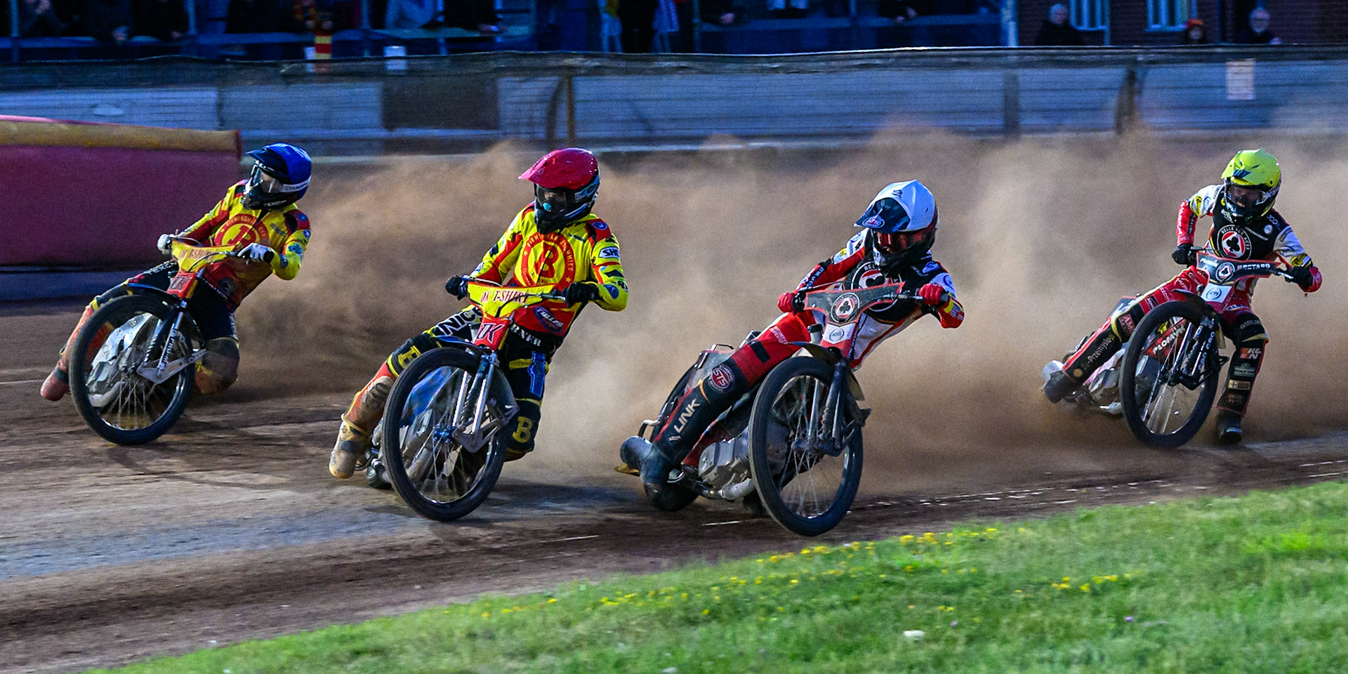 Birmingham Brummies' Matej Zagar in Red leading Birmingham Brummies' Tobiasz Musielak in Blue, Belle Vue Aces' Zach Cook in White and Belle Vue Aces' Dan Bewley in Yellow during the Rowe Motor Oil Premiership match between Birmingham Brummies and Belle Vue Aces at Perry Bar Stadium, Birmingham on Monday 2nd June 2025. (Photo: Ian Charles | MI News)