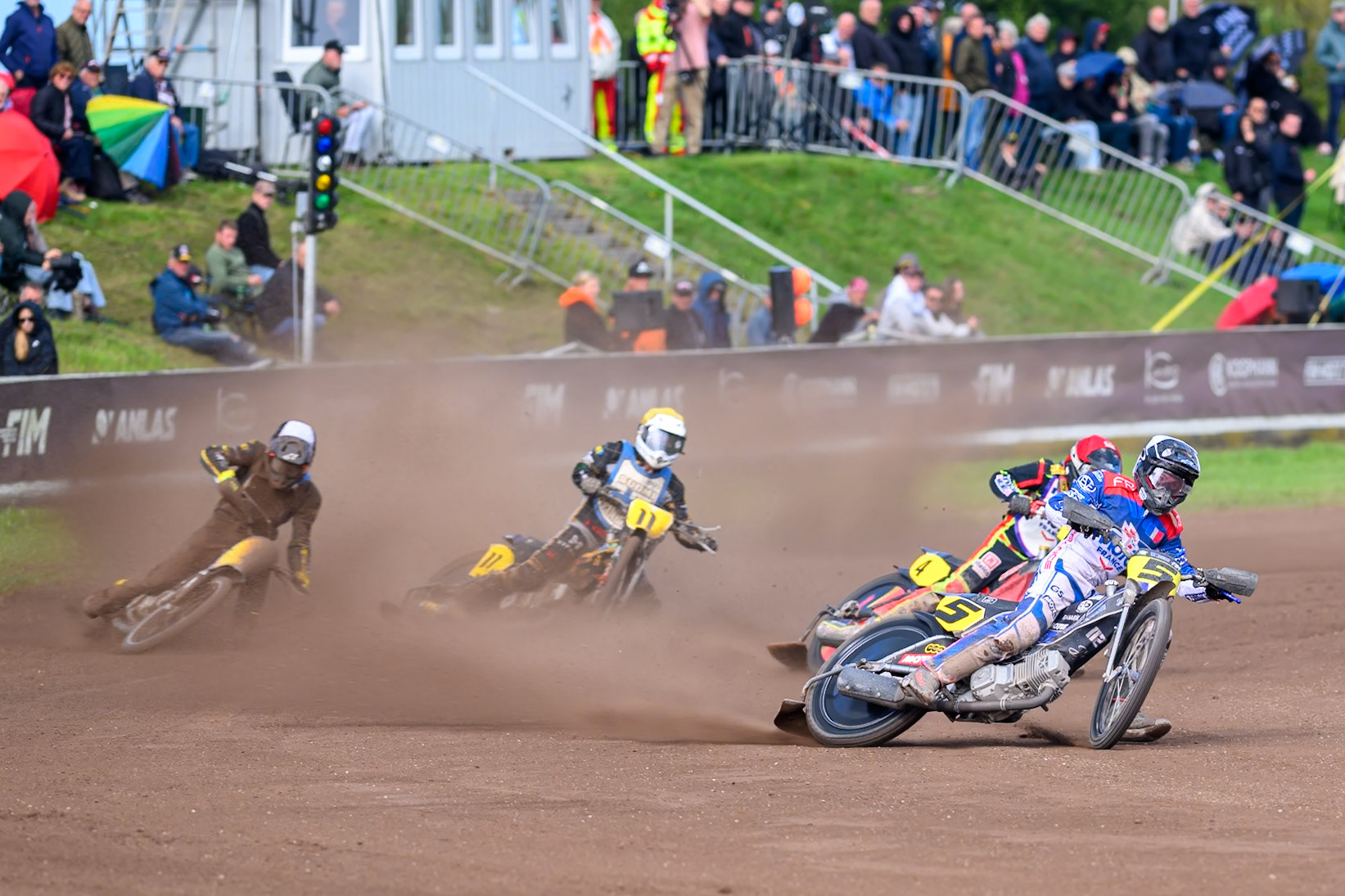 Tino Bouin (5) of France in White leading Mathias Tresarrieu (4) of France in Red  Jesse Mustonen (11) of Finland in Yellow and Ossi Rantala (12) of Finland in Black &amp; White  during the FIM Long Track of Nations 2026 at the Speed Centre Roden in the Netherlands on Sunday 20th September 2026. (Photo: Ian Charles | MI News)