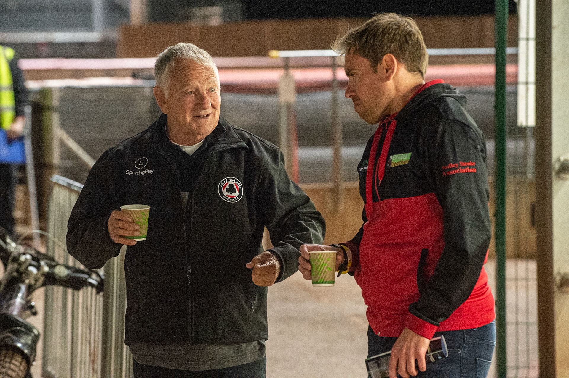 Photo: Ian Charles

Old rivals chat: Jack Lee (former Buxton manager - left) chats with Cradley Manager Will Pottinger

Belle Vue Colts v Cradley Heathens, SGB National League, Belle Vue National Speedway Stadium, Manchester, Thursday 29  August  2019