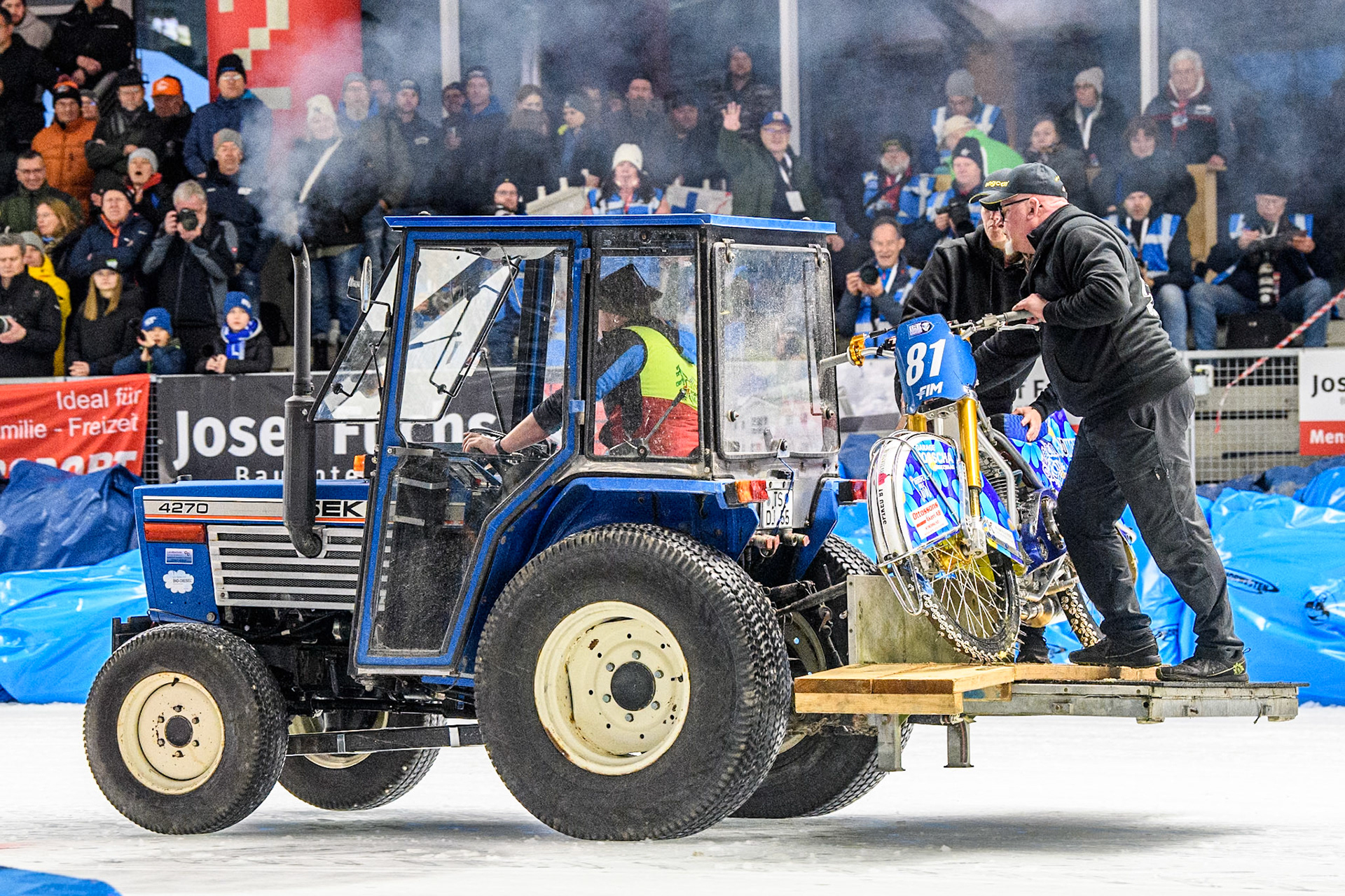 Mechanics recover Jimmy Olsén (81) of Sweden’s bike after his fall during the Ice Speedway Gladiators World Championship Final 1 at Max-Aicher-Arena, Inzell on Saturday 15th March 2025. (Photo: Ian Charles | MI News)