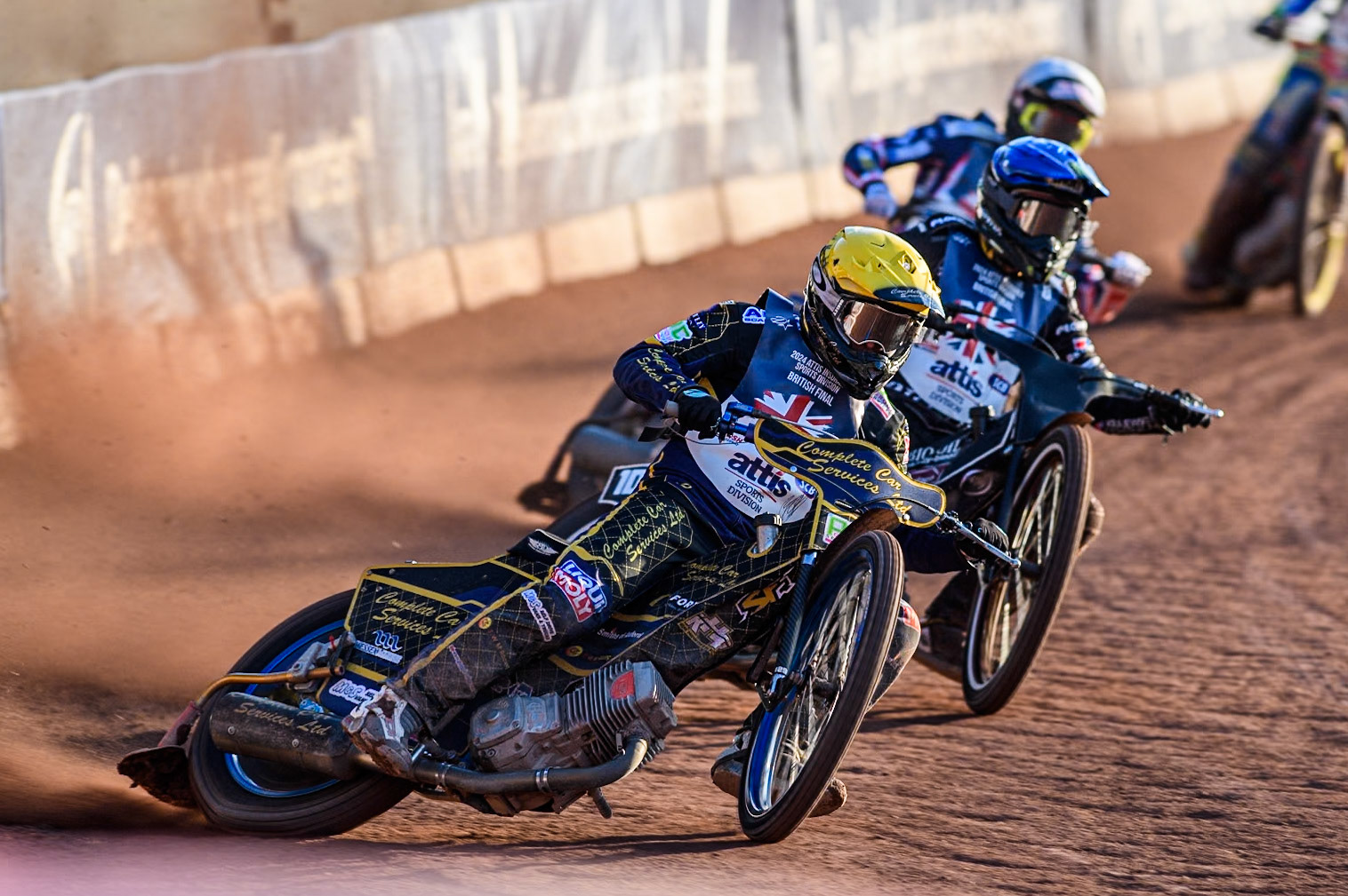 Kyle Howarth in Yellow leading Tai Woffinden in Blue and Anders Rowe in White during the Attis Insurance Sports Division British Speedway Championship Final at the National Speedway Stadium, Manchester on Saturday 8th June 2024. (Photo: Ian Charles | MI News)
