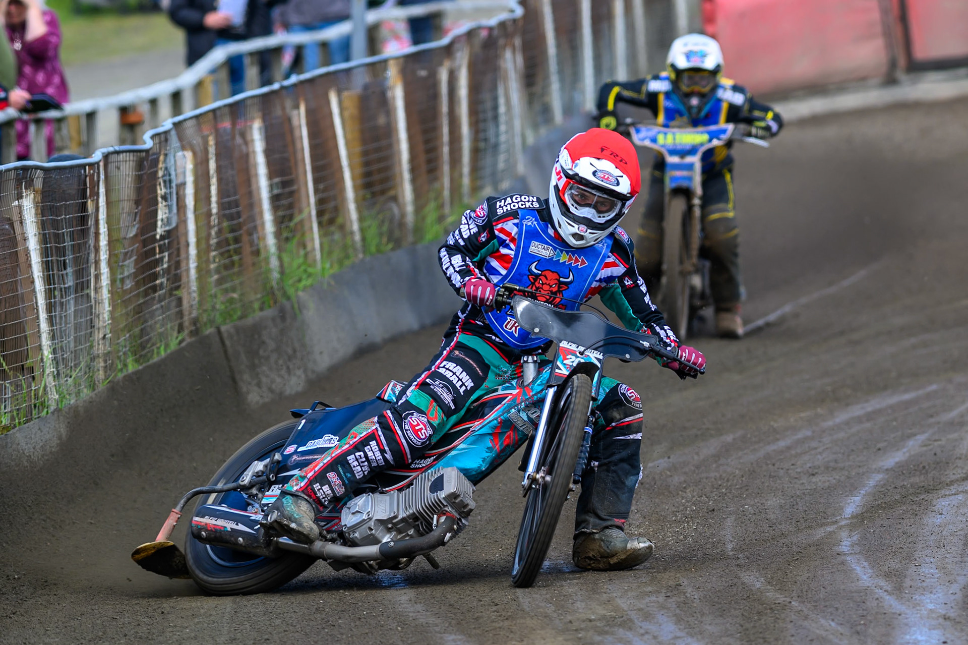 Alfie Bowtell of Buxton Bulls in Red leading Dayle Wood of Edinburgh Monarchs Academy in White during the WSRA National Development League match between Buxton Bulls and Edinburgh Monarchs Academy at Hi-Edge Speedway, Buxton on Sunday 14th June 2026. (Photo: Ian Charles | MI News)