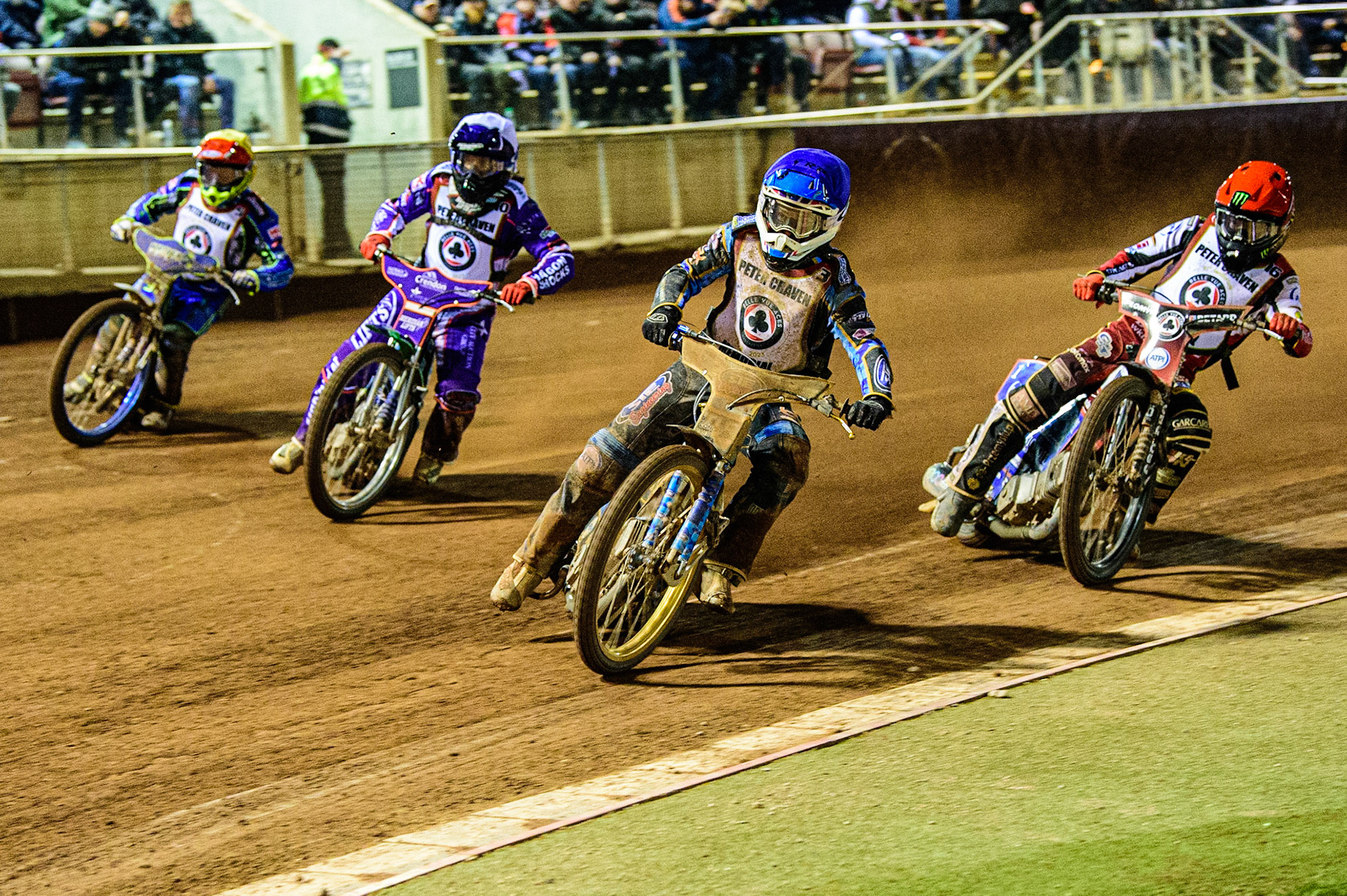 Justin Sedgmen  (Blue) leads Dan Bewley  (Red), Hans Andersen  (White) and Chris Harris  (Yellow) during the Peter Craven Memorial Trophy  at the National Speedway Stadium, Manchester on Monday 3rd April 2023. (Photo: Ian Charles | MI News)