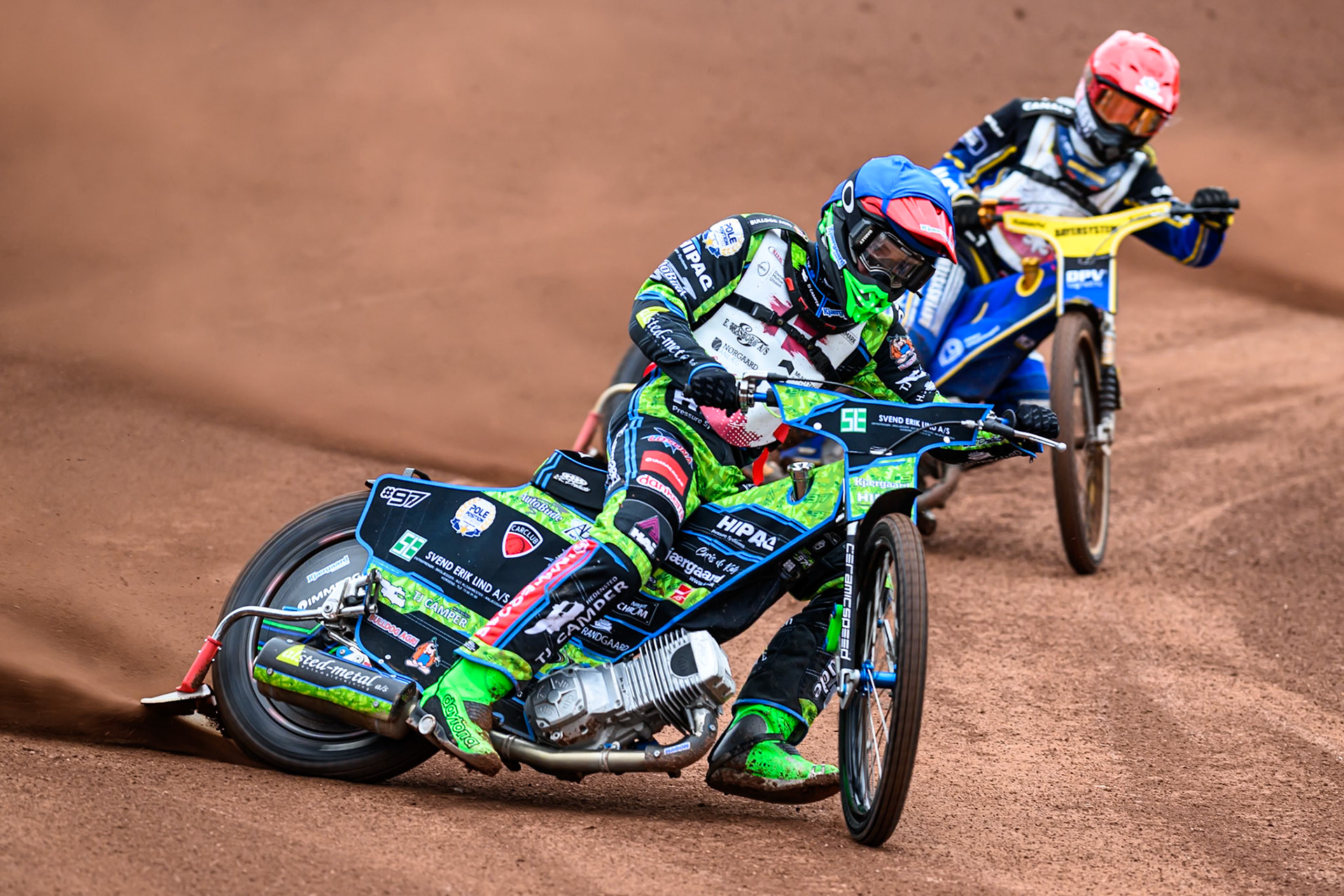 Mikkel Andersen of Denmark in Blue leading Jan Przanowski of Poland in Red during the FIM SGP2 Qualifying Round at the Peugeot Ashfield Stadium in Glasgow on Saturday 24th May 2025. (Photo: Ian Charles | MI News)