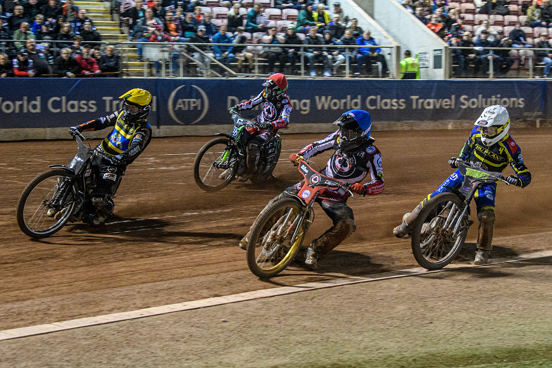 Norick Blodorn (Blue) inside Tai Woffinden (Yellow) and Josh Pickering (White) with Charles Wright (Red) on the outside during the Sports Insure Premiership match between Belle Vue Aces and Sheffield Tigers at the National Speedway Stadium, Manchester on Monday 7th August 2023. (Photo: Ian Charles | MI News)