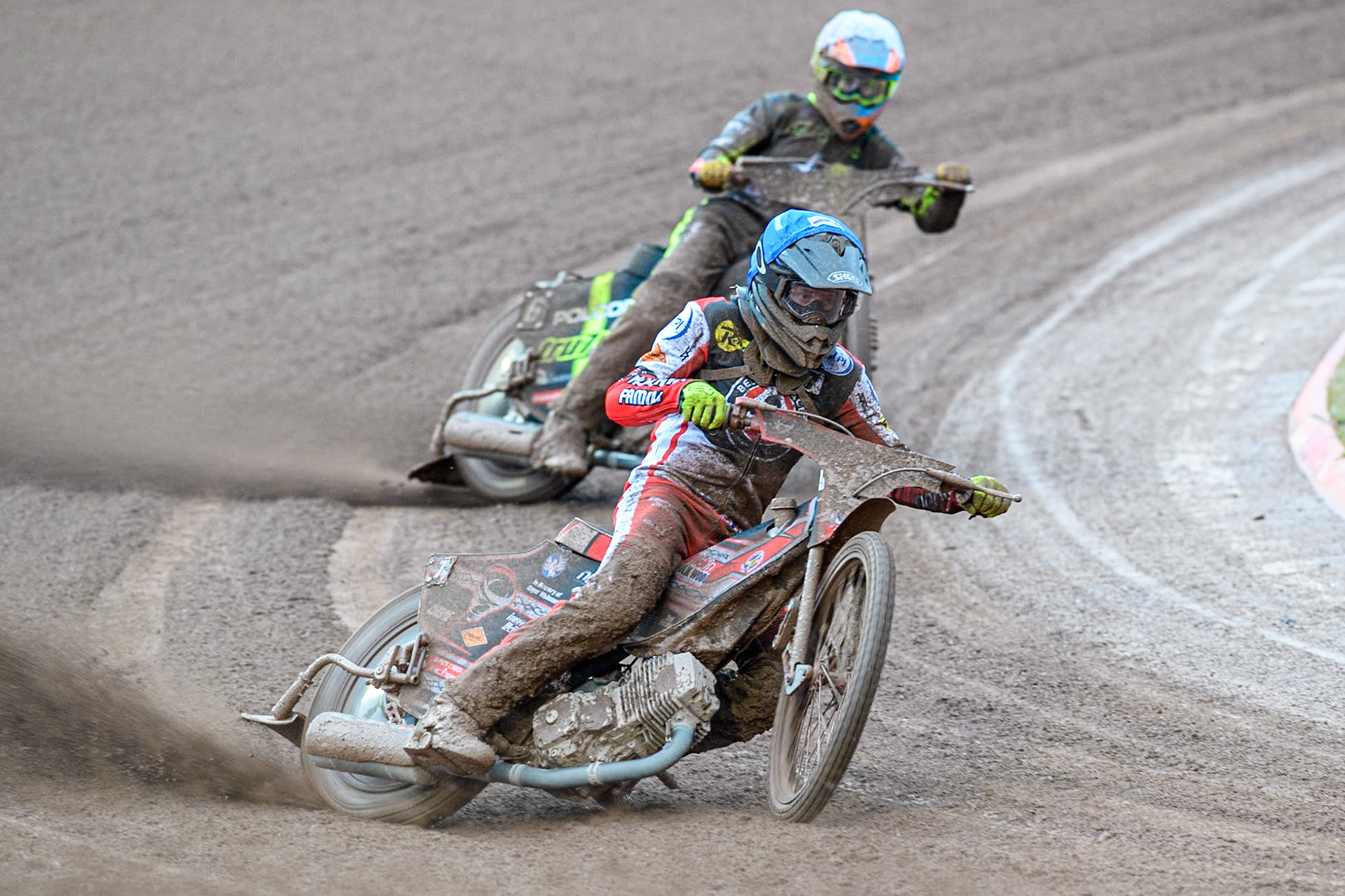 Belle Vue Aces' Connor Bailey in Blue leading Ipswich Witches' Keynan Rew in White during the Rowe Motor Oil Premiership match between Belle Vue Aces and Ipswich Witches at the National Speedway Stadium, Manchester on Monday 22nd April 2024. (Photo: Ian Charles | MI News)