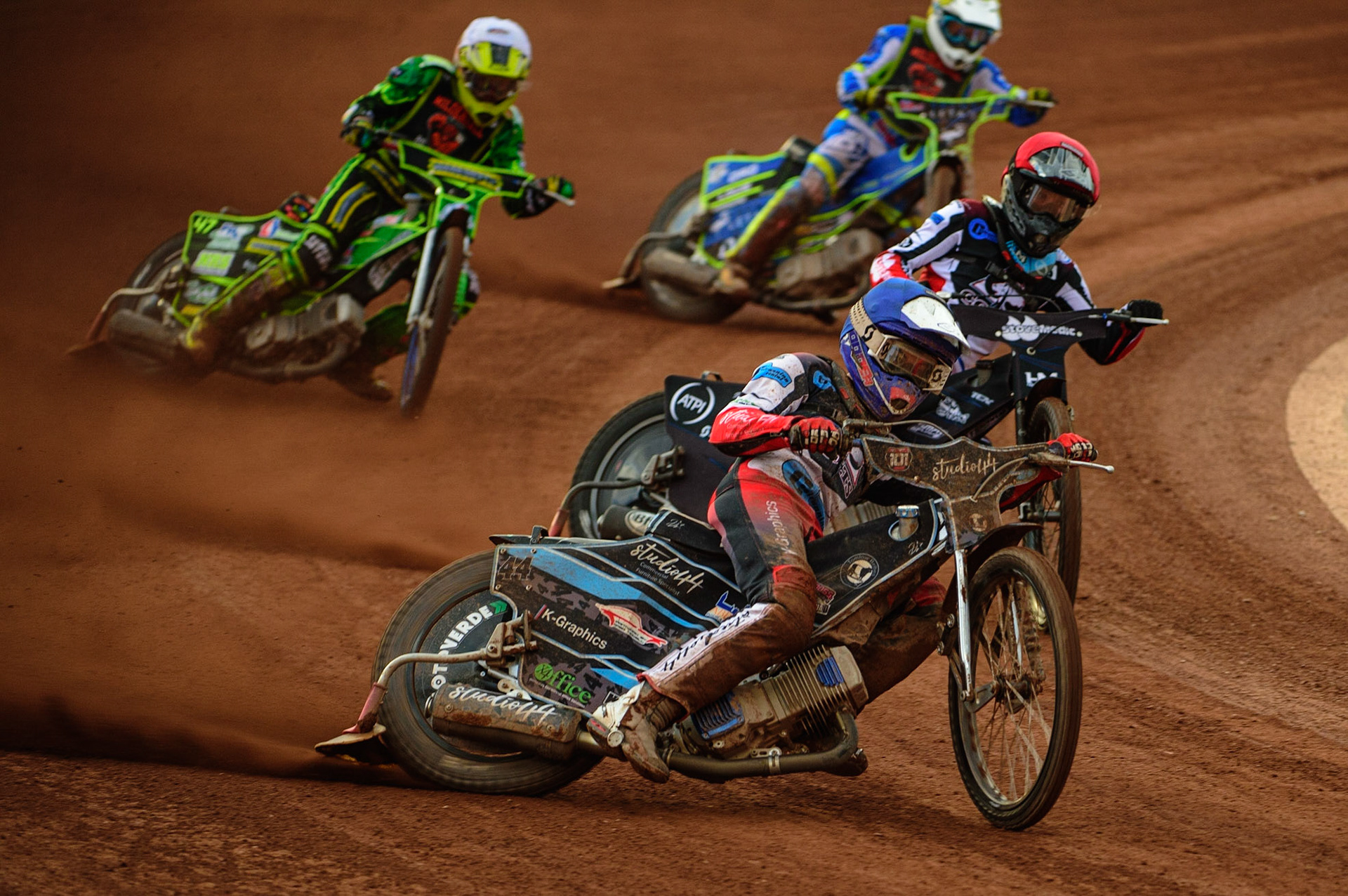 Freddy Hodder  (Blue) leads Harry McGurk  (Red) Sam Bebee  (White) and Luke Muff  (Yellow) during the National Development League match between Belle Vue Colts and Mildenhall Fens Tigers at the National Speedway Stadium, Manchester on Friday 15th July 2022. (Credit: Ian Charles | MI News)
