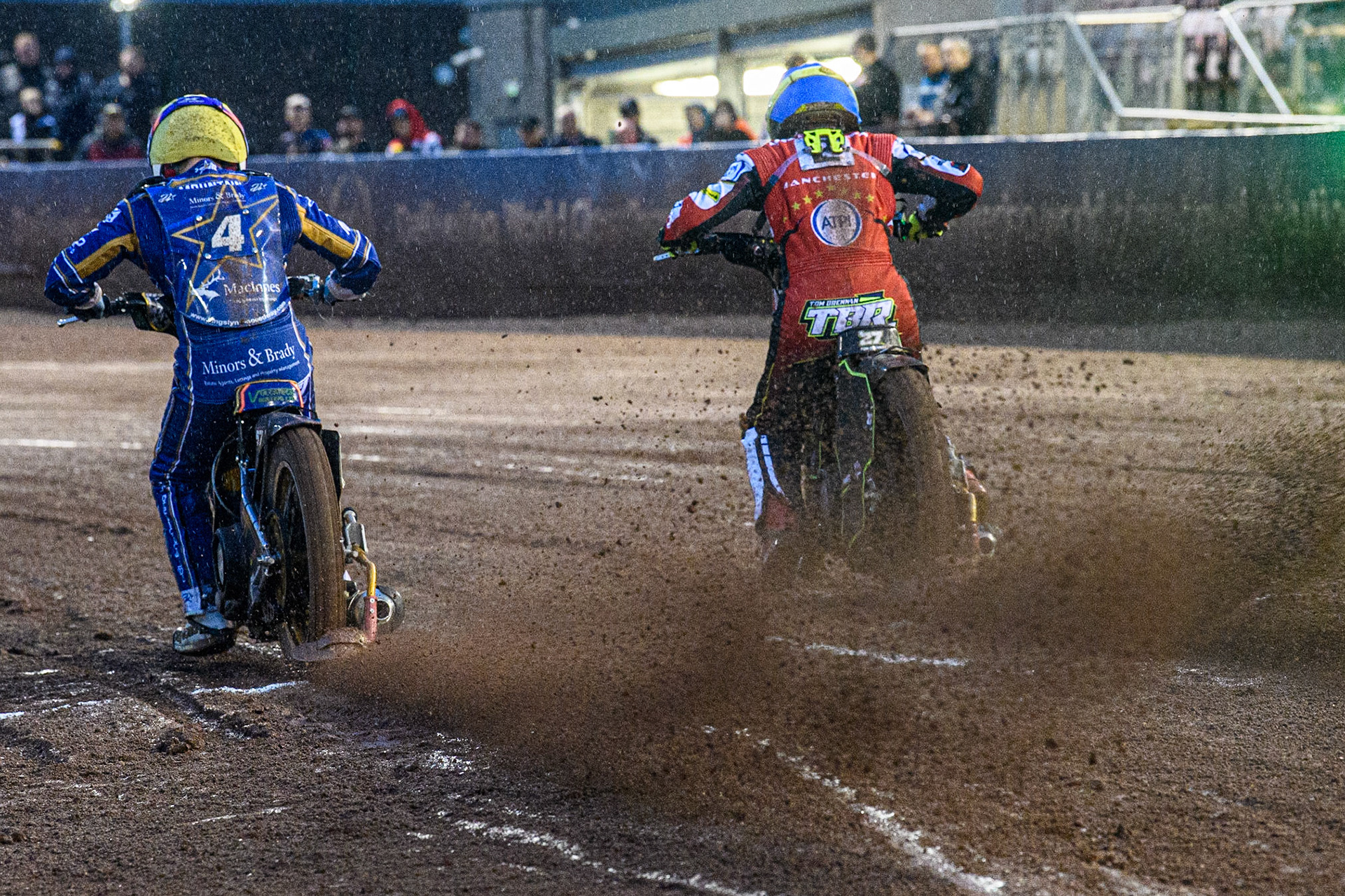 Connor Mountain (Yellow) and Tom Brennan (Blue) leave the start during the Sports Insure Premiership match between Belle Vue Aces and King's Lynn Stars at the National Speedway Stadium, Manchester on Monday 21st August 2023. (Photo: Ian Charles | MI News)
