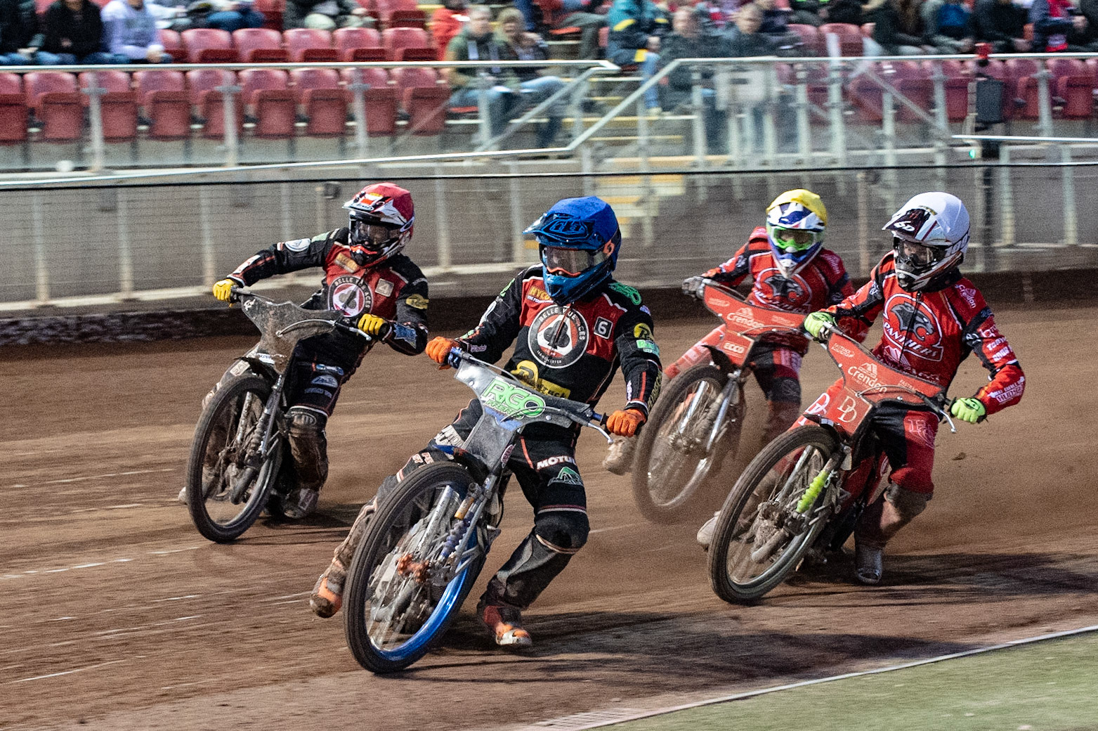 Photo by Ian Charles:

Dimitri Berge  (Blue) and Ricky Wells  (Red) lead Charles Wright  (White) and Ben Barker  (Yellow)

Belle Vue Aces v Peterborough Panthers, British Speedway Premiership, National Speedway Stadium, Manchester, Monday, 29, April, 2019