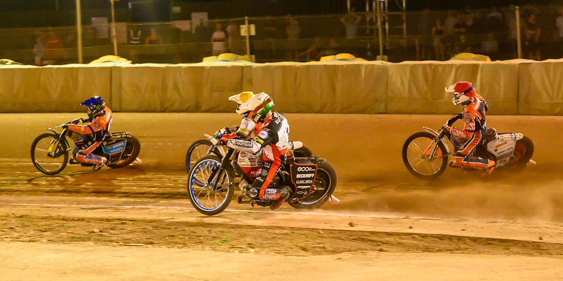 Jaimon Lidsey of Northampton Foxes  in Blue leading Chris Harris Guest Rider for Belle Vue Aces in Yellow , Brady Kurtz of Belle Vue Aces  in White and Niels-Kristian Iversen of Northampton Foxes  in Red during the Rowe Motor Oil Premiership match between Northampton Foxes and Belle Vue Aces at Northampton International Shaleway, Northampton on Thursday 13th August 2026. (Photo: Ian Charles | MI News)