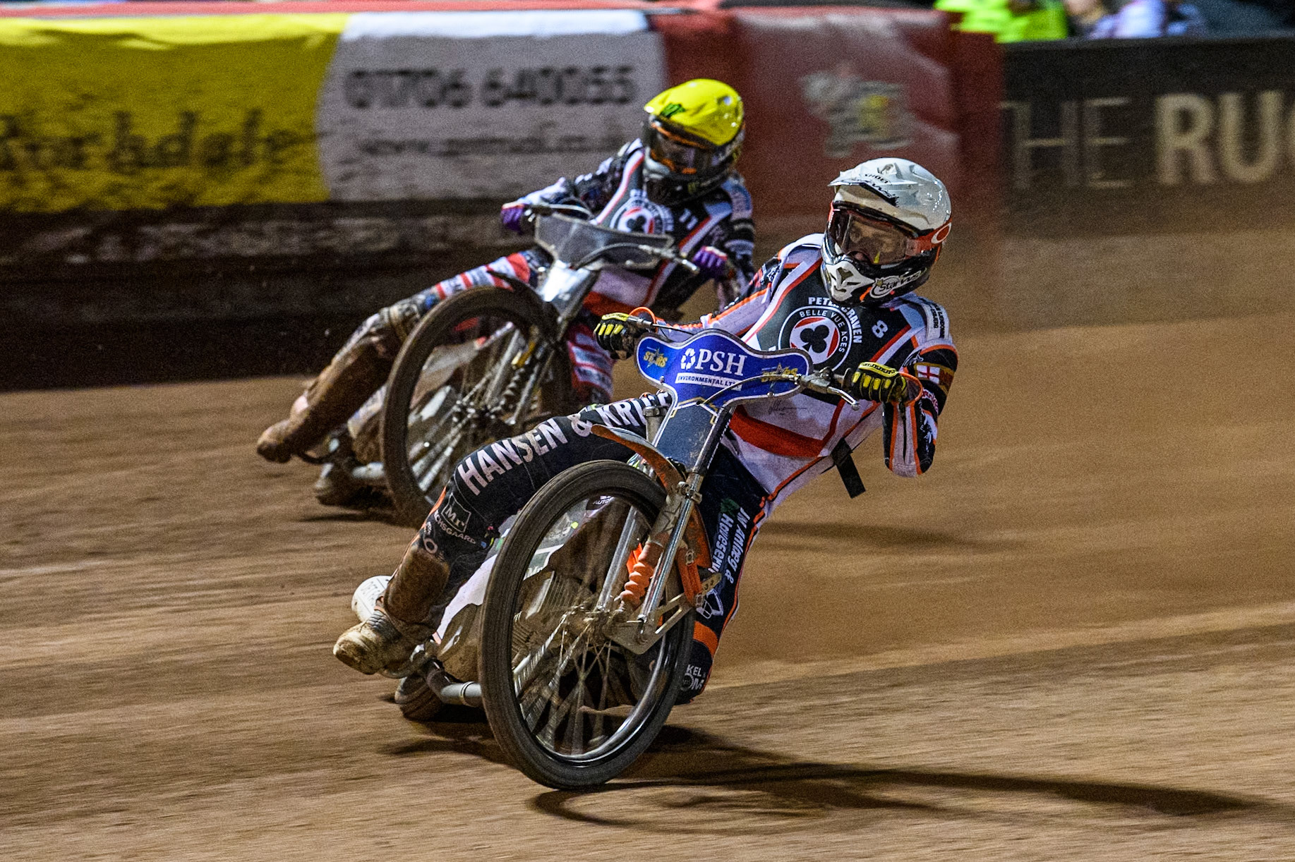 Denmark's Niels-Kristian Iversen (White) leads  Sweden’s Fredrik Lindgren (Yellow) during the Peter Craven Memorial Trophy meeting at the National Speedway Stadium, Manchester on Monday 18th March 2024. (Photo: Ian Charles | MI News)