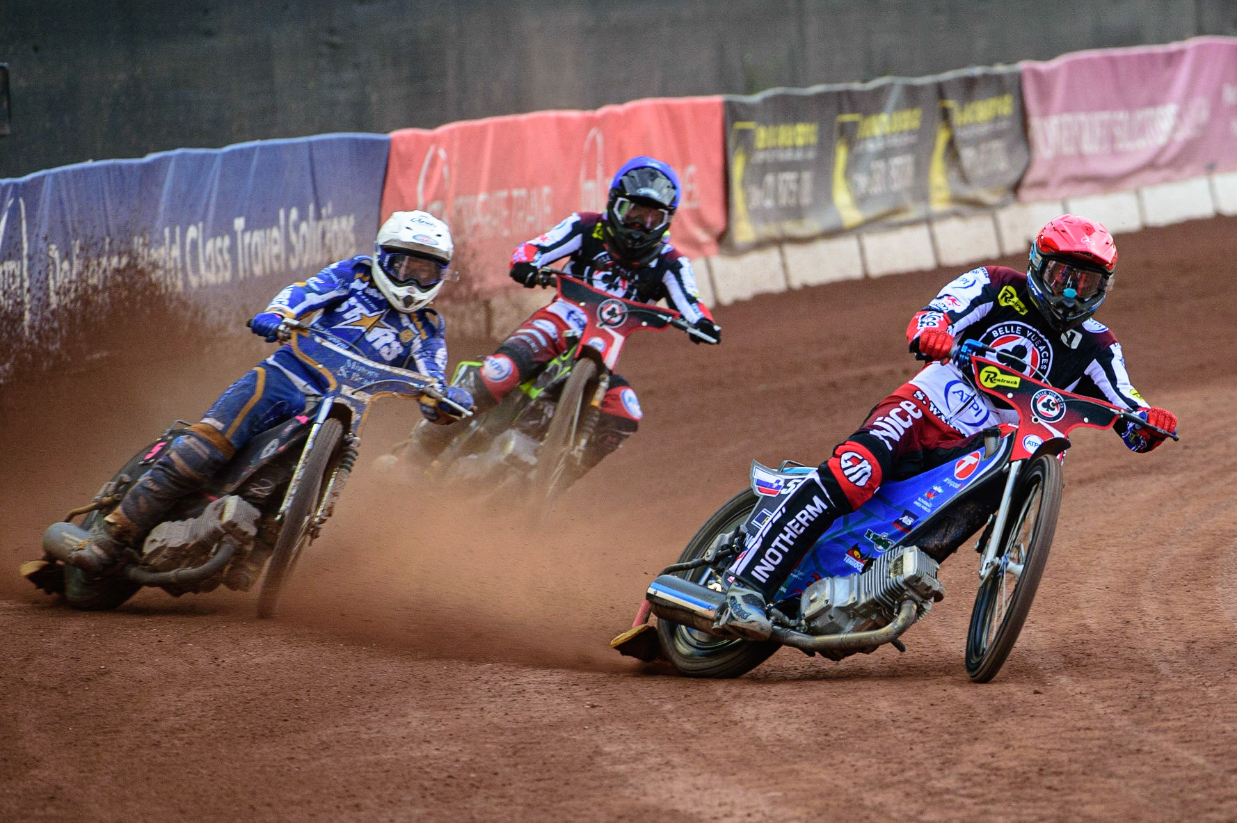 MANCHESTER UK  Matej Zagar  (Red) leads Josh Pickering  (White) and Tom Brennan  (Blue) during the SGB Premiership match between Belle Vue Aces and King's Lynn Stars at the National Speedway Stadium, Manchester on Monday 11th July 2022. (Credit: Ian Charles | MI News)