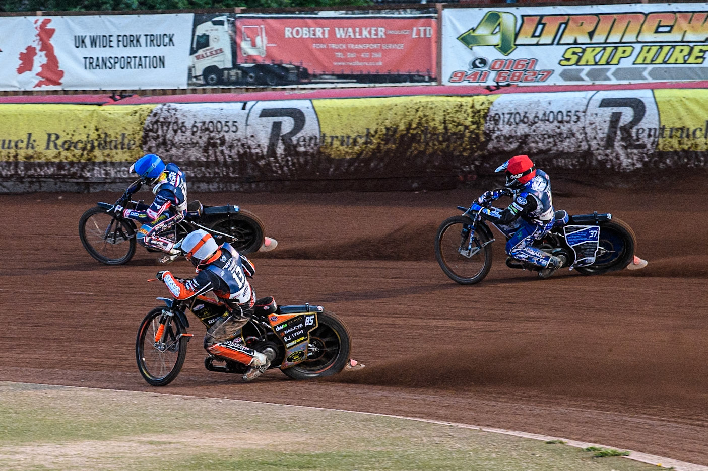 Jordan Jenkins in White  chases Chris Harris in Red and Anders Rowe in Blue during the Attis Insurance Sports Division British Speedway Championship Final at the National Speedway Stadium, Manchester on Saturday 8th June 2024. (Photo: Ian Charles | MI News)