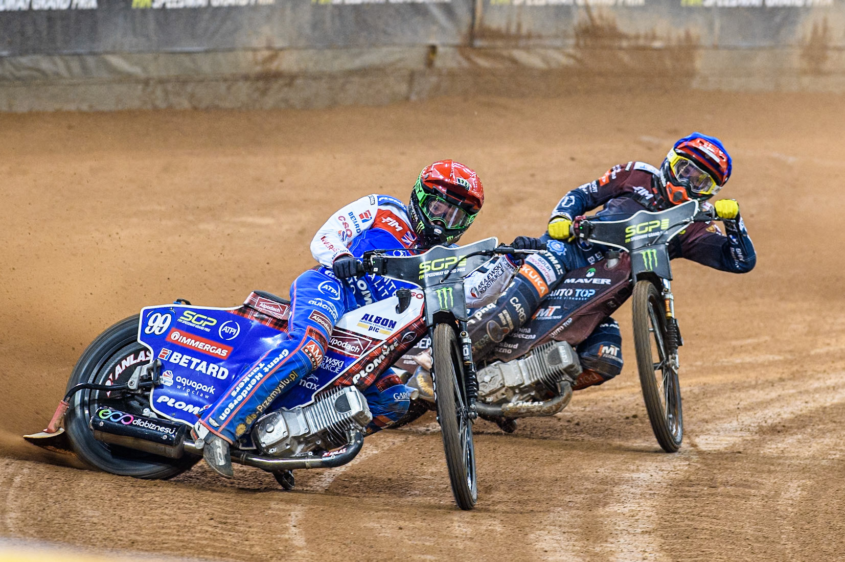 Daniel Bewley (99) of Great Britain in Red leading \Dominik Kubera (415) of Poland in Blue during the FIM Speedway Grand Prix of Great Britain at The Principality Stadium, Cardiff on Saturday 17th August 2024. (Photo: Ian Charles | MI News)