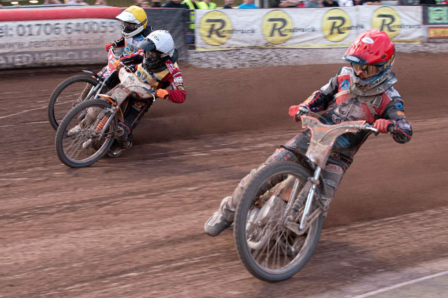 Photo: Ian Charles

Jordan Palin  (Red) inside Jack Smith  (White) and Ben Morley  (Yellow)

Belle Vue Colts v Isle Of Wight Warriors, SGB National League KO Cup Quarter Final 1st Leg, Belle Vue National Speedway Stadium, Manchester, Monday 22  July  2019