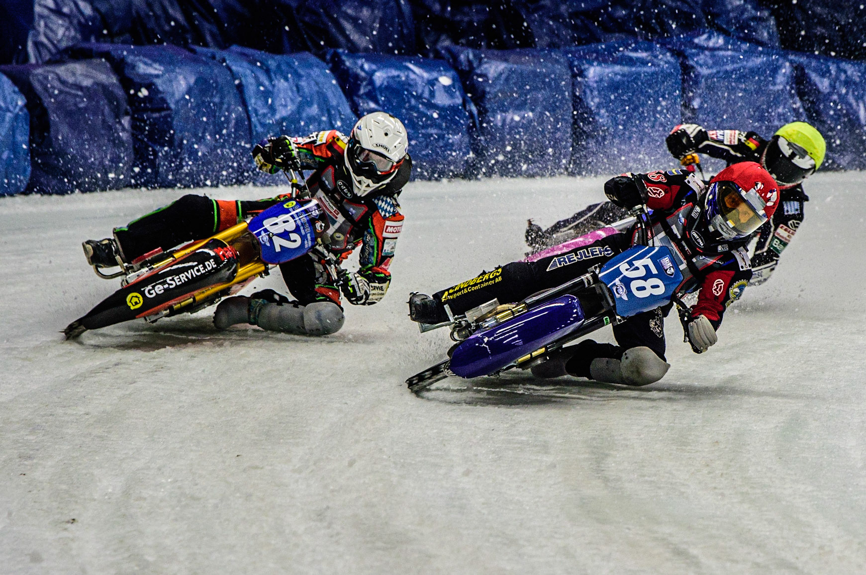 Stefan Svensson (58) (Red) inside Markus Jell (82) (White) with Lukas Hutla (212) behind during the Ice Speedway Gladiators World Championship Final 1 at Max-Aicher-Arena, Inzell, Germany on Saturday 18th March 2023. (Photo: Ian Charles | MI News)