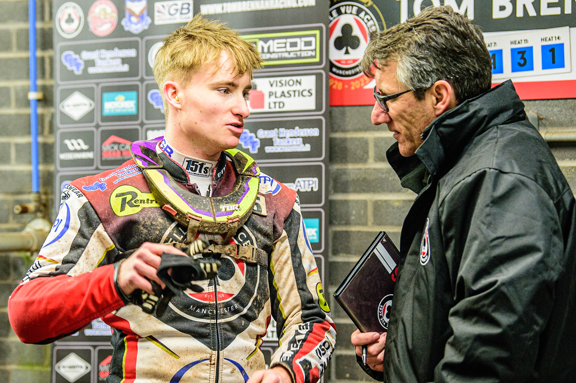 Tom Brennan  (left) chats with Mark Lemon  Team Manager of Belle Vue ‘ATPI’ Aces  during the SGB Premiership match between Belle Vue Aces and Sheffield Tigers at the National Speedway Stadium, Manchester on Monday 27th March 2023. (Photo: Ian Charles | MI News)