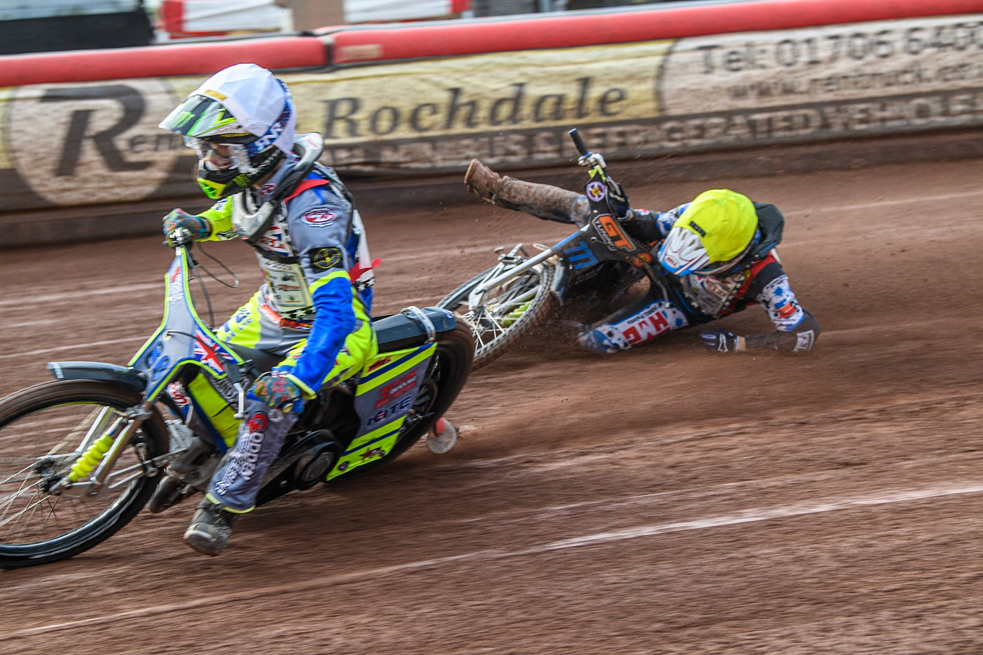 Sonny Springer (White) collides with Billy Budd (Yellow) and causes Budd to fall during the British Youth Speedway Championships at the National Speedway Stadium, Manchester on Friday 21st July 2023. (Photo: Ian Charles | MI News)