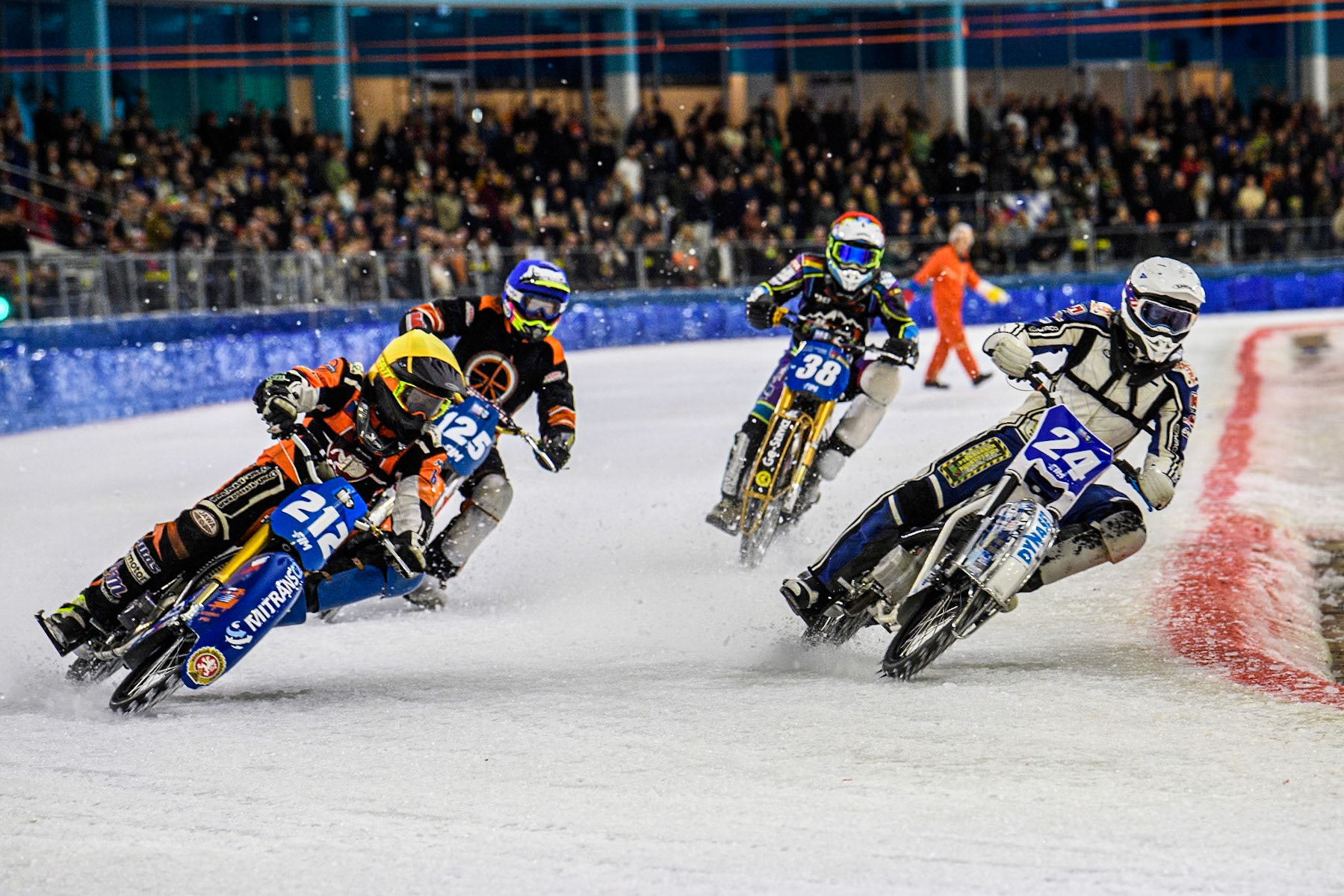 Max Koivula (24) of Finland in White rides inside Lukas Hutla (212) of the Czech Republic in Yellow with Sebastian Reitsma (125) of The Netherlands in Blue and Maximilian Niedermaier (38) of Germany in Red behind during the FIM Ice Speedway Gladiators World Championship, Final 4 at the Ice Stadium, Thialf, Heerenveen on Sunday 6th April 2025. (Photo: Ian Charles | MI News)