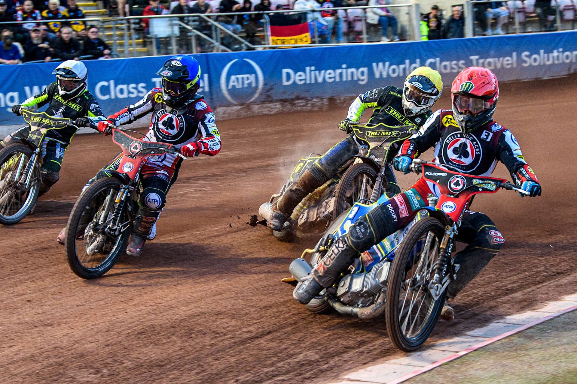 Jaimon Lidsey (Red) and Tom Brennan (Blue) lead Danny King (White) and Danyon Hume (Yellow) during the Sports Insure Premiership match between Belle Vue Aces and Ipswich Witches at the National Speedway Stadium, Manchester on Monday 17th July 2023. (Photo: Ian Charles | MI News)