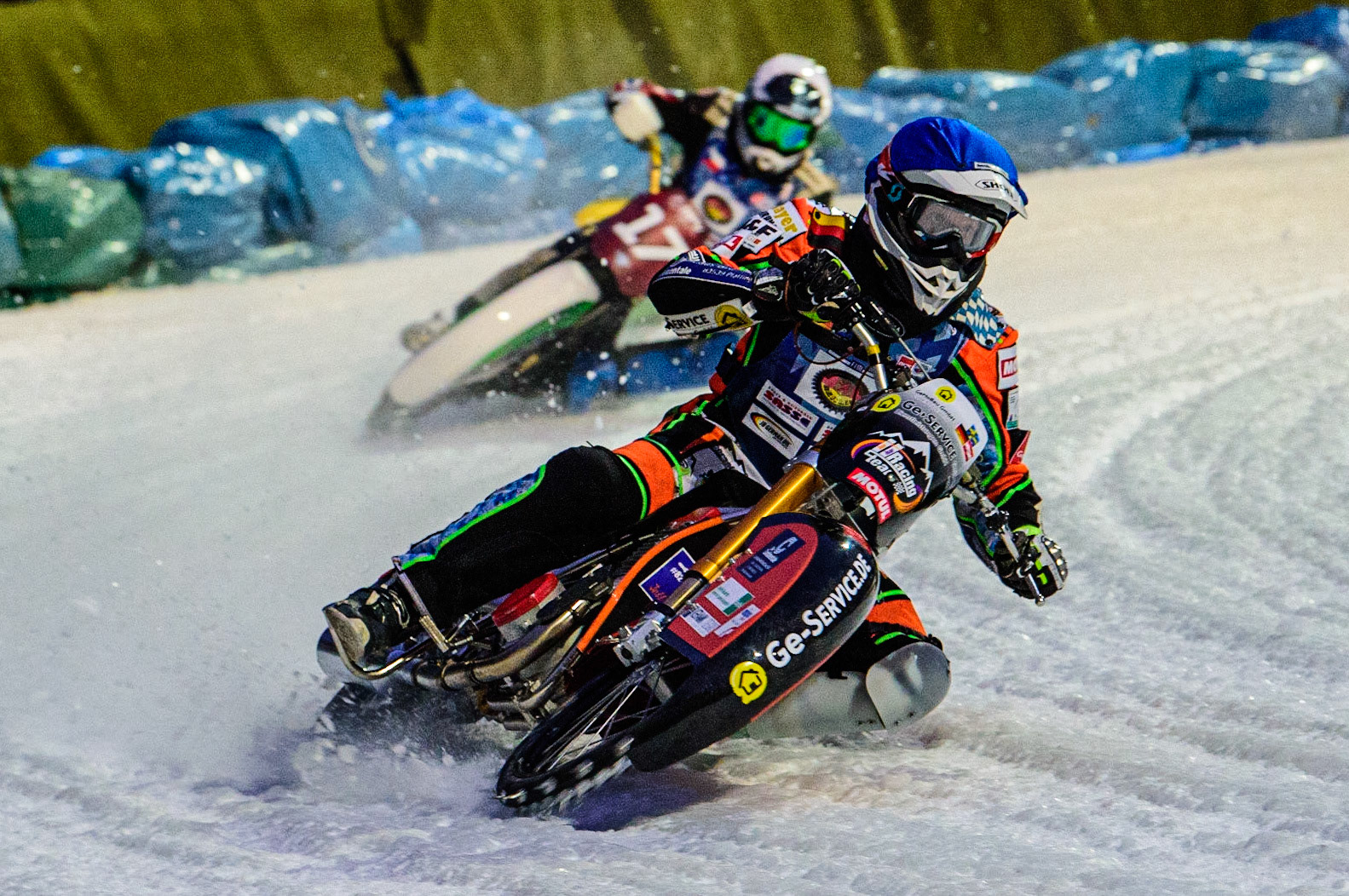 Markus Jell (Blue) leads Andrej Divis (White) during the German Individual Ice Speedway Championship at Horst-Dohm-Eisstadion, Berlin on Friday 3rd March 2023. (Photo: Ian Charles | MI News)