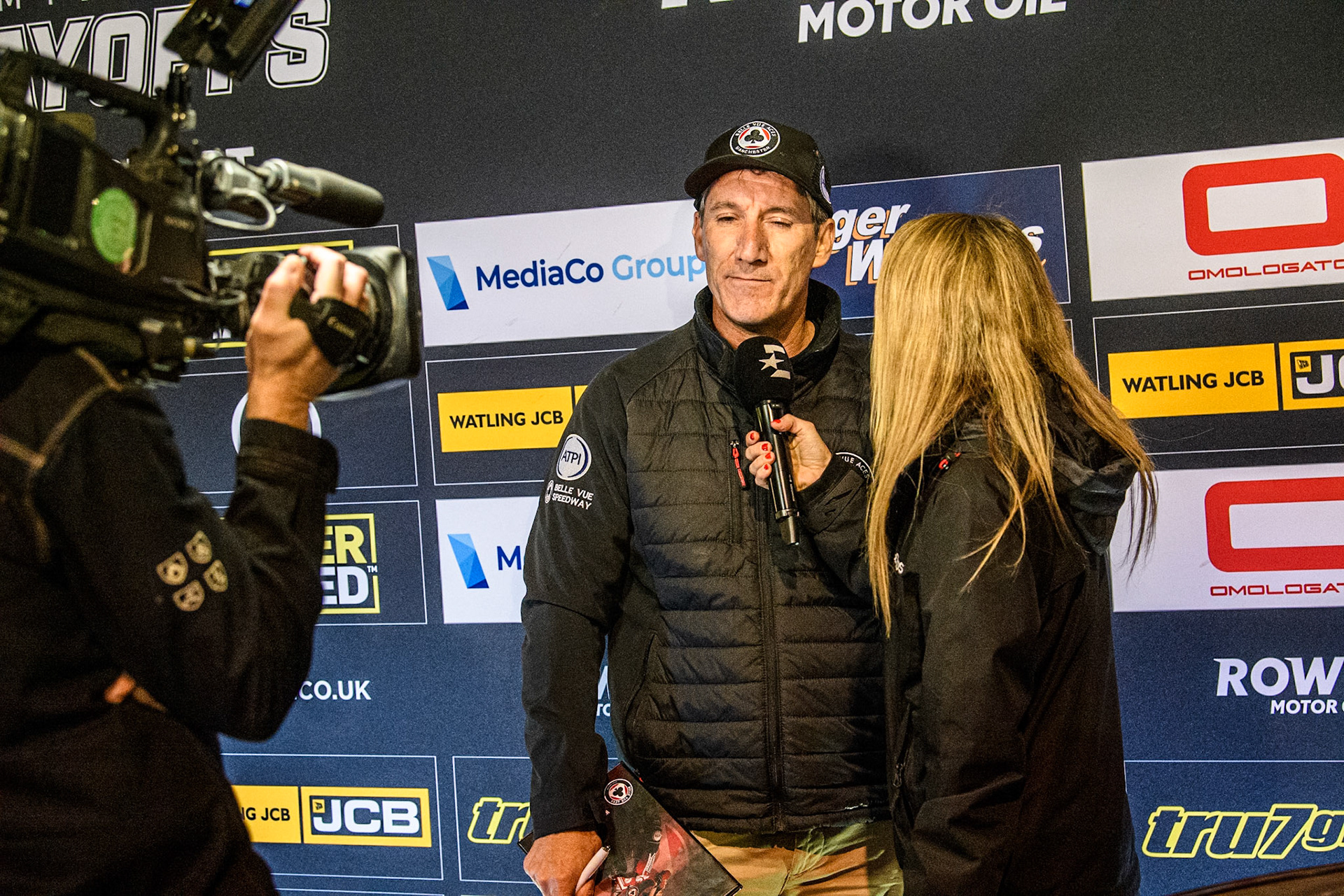 Belle Vue Aces' Team Manager Mark Lemon gives an interview to Eurosport presenter Abi Stephens during the Rowe Motor Oil Premiership Play Off Semi Final 2nd leg between Sheffield Tigers and Belle Vue Aces at Owlerton Stadium, Sheffield on Thursday 19th September 2024. (Photo: Ian Charles | MI News)
