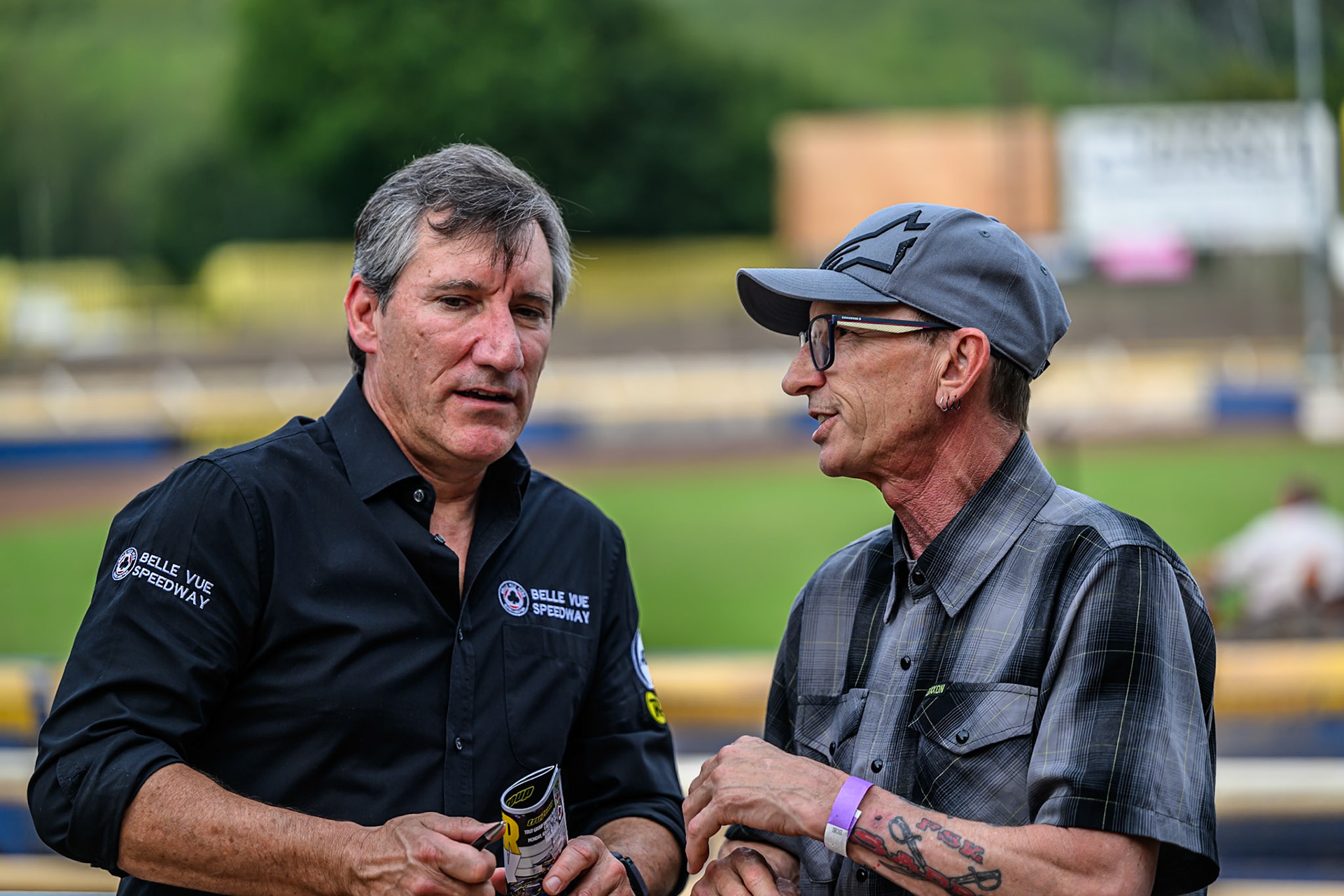 Mark Lemon, Team Manager of Belle Vue Aces (Left) chats with former rider and fellow Aussie, Shane Parker during the Rowe Motor Oil Premiership match between Sheffield Tigers and Belle Vue Aces at Owlerton Stadium, Sheffield on Monday 11th August 2025. (Photo: Ian Charles | MI News)