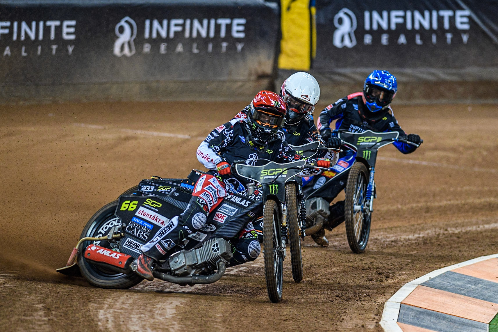 Freddie Lindgren (66) (Red) leads  Kim Nilsson (233) (White) and Leon Madsen (30) (Blue) during the FIM Speedway Grand Prix of Great Britain at the Principality Stadium, Cardiff on Saturday 2nd September 2023. (Photo: Ian Charles | MI News)