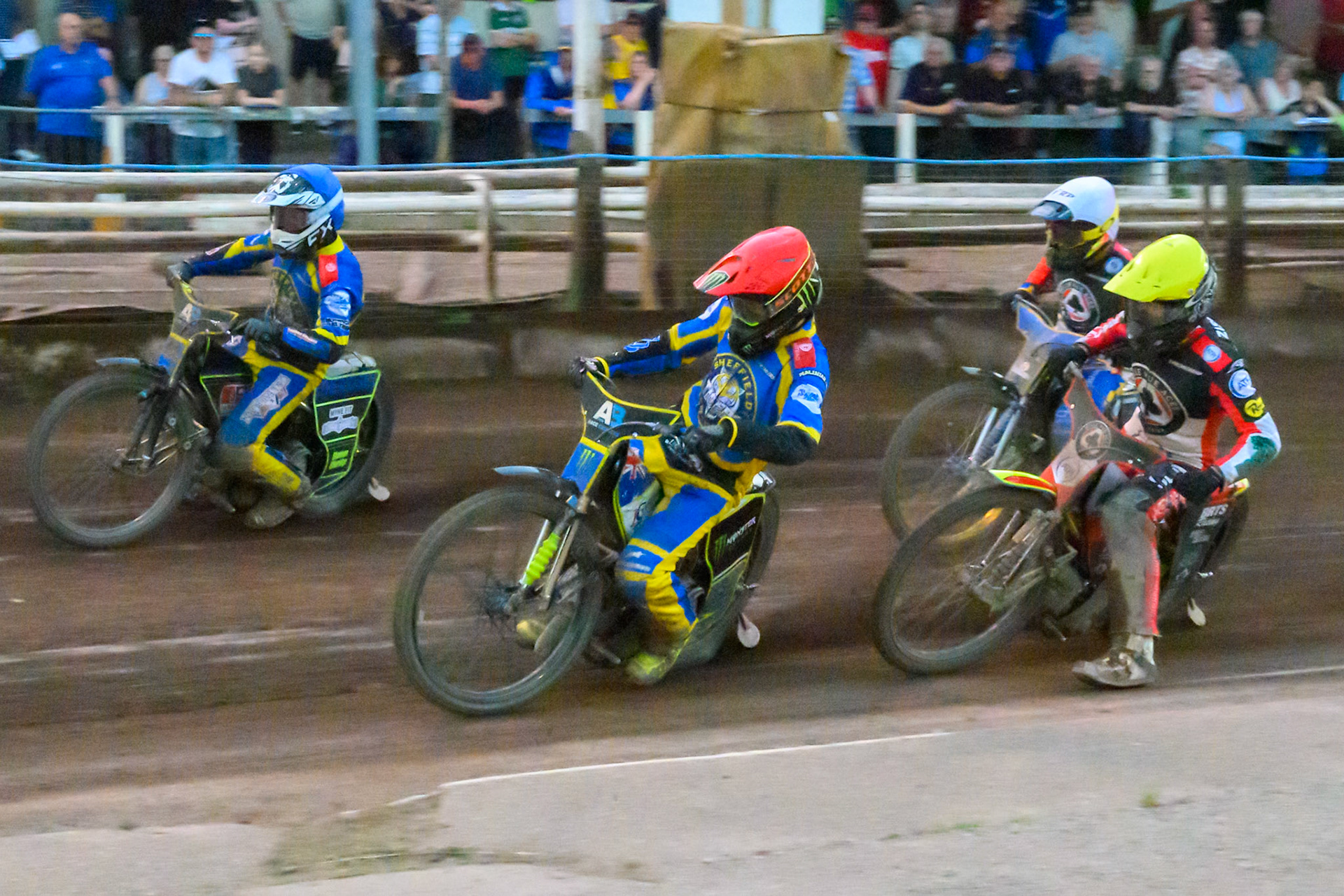 Chris Holder of Sheffield Tigers in Red rides inside Jye Etheridge of Sheffield Tigers in Blue with Tate Zischke of Belle Vue Aces in Yellow and Justin Sedgman, Guest Rider for Belle Vue Aces in White behind during the Rowe Motor Oil Premiership match between Sheffield Tigers and Belle Vue Aces at Owlerton Stadium, Sheffield on Monday 25th May 2026. (Photo: Ian Charles | MI News)