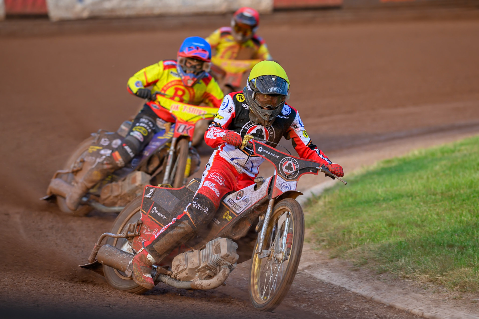 Belle Vue Aces' Norick Blodorn in Yellow leading Birmingham Brummies' Paco Castagna in Blue and Birmingham Brummies' Tobiasz Musielak in Red during the Rowe Motor Oil Premiership match between Birmingham Brummies and Belle Vue Aces at Perry Bar Stadium, Birmingham on Monday 2nd June 2025. (Photo: Ian Charles | MI News)