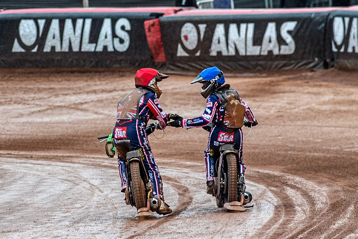 Leon Flint of Great Britain in Red and Dan Thompson of Great Britain celebrate their heat win during the Monster Energy FIM Speedway of Nations 2 (Under 21) Final at the National Speedway Stadium, Manchester on Friday 12th July 2024. (Photo: Ian Charles | MI News)