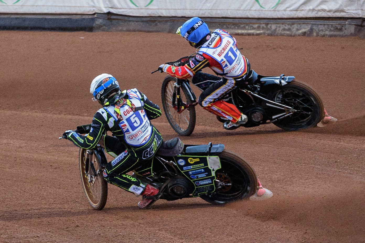 MANCHESTER, UK. AUGUST 16TH   Craig Cook (White) tries to pass Scott Nicholls  (Blue) during the Sports Insure British Speedway Finals at the National Speedway Stadium, Manchester on Monday 16th August 2021. (Credit: Ian Charles | MI News)