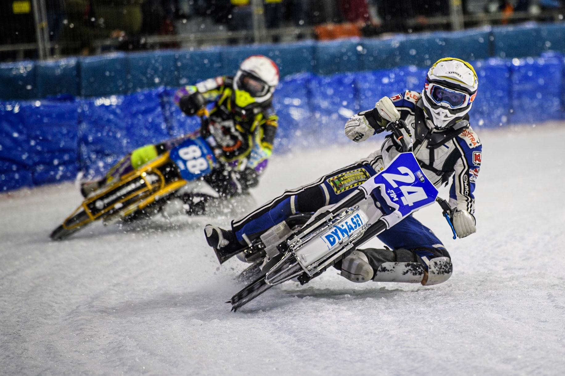 Max Koivula (24) of Finland in Yellow leading Max Niedermaier  (88) of Germany in Red during the FIM Ice Speedway Gladiators World Championship, Final 4 at the Ice Stadium, Thialf, Heerenveen on Sunday 6th April 2025. (Photo: Ian Charles | MI News)