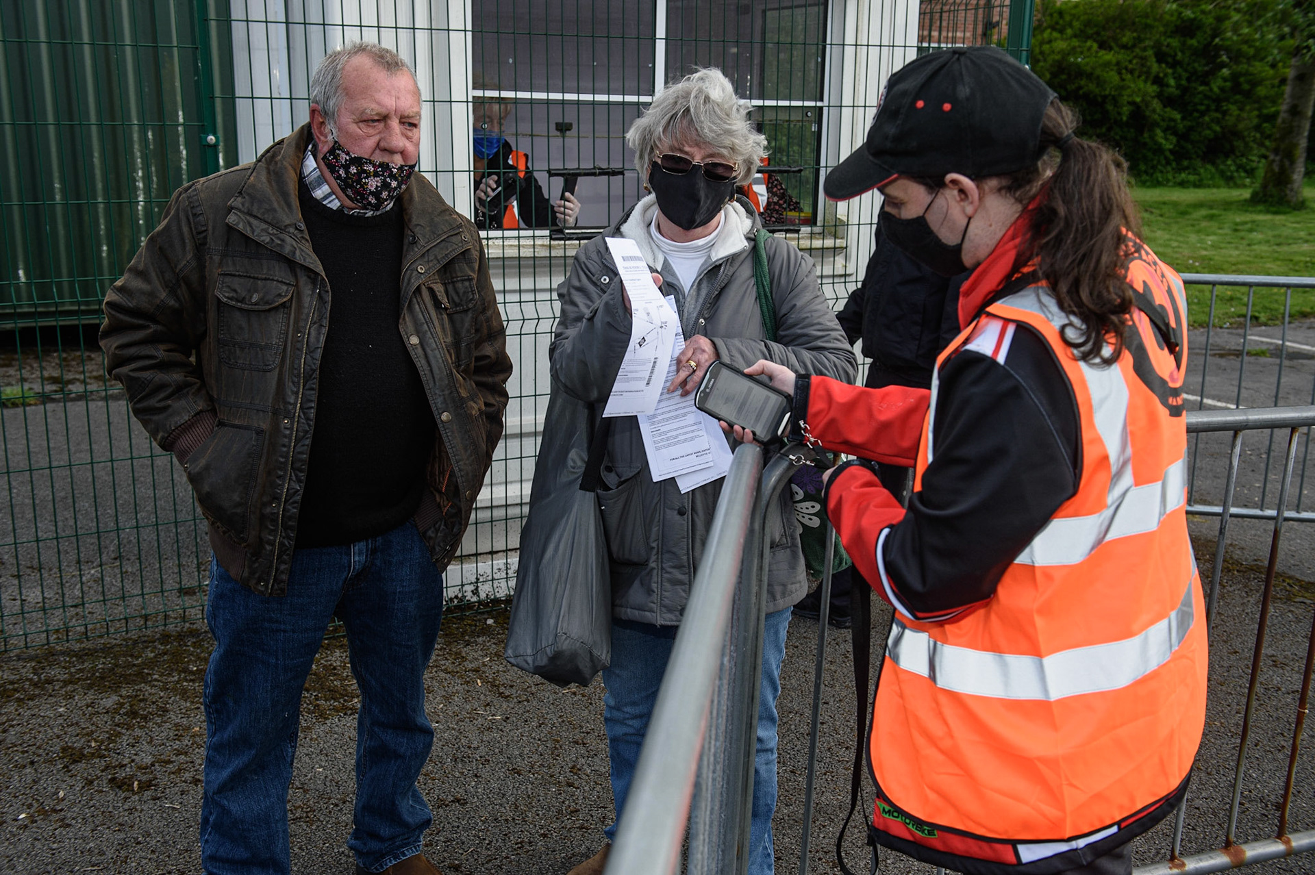 MANCHESTER, UK. MAY 17THA fan has his ticket checked to get into the Stadium during the SGB Premiership match between Belle Vue Aces and Sheffield Tigers at the National Speedway Stadium, Manchester on Monday 17th May 2021. (Credit: Ian Charles | MI News)