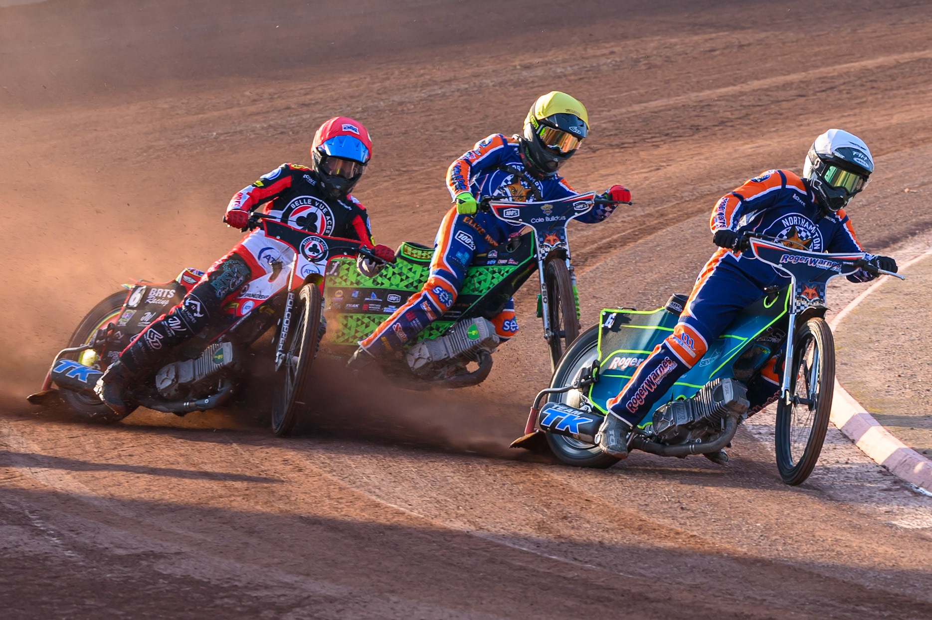Troy Batchelor of Northampton Foxes  in White leading Tate Zischke of Belle Vue Aces in Red  and Luke Harrison of Northampton Foxes in Yellow during the Rowe Motor Oil Premiership match between Belle Vue Aces and Northampton Foxes at the National Speedway Stadium, Manchester on Monday 13th July 2026. (Photo: Ian Charles | MI News)