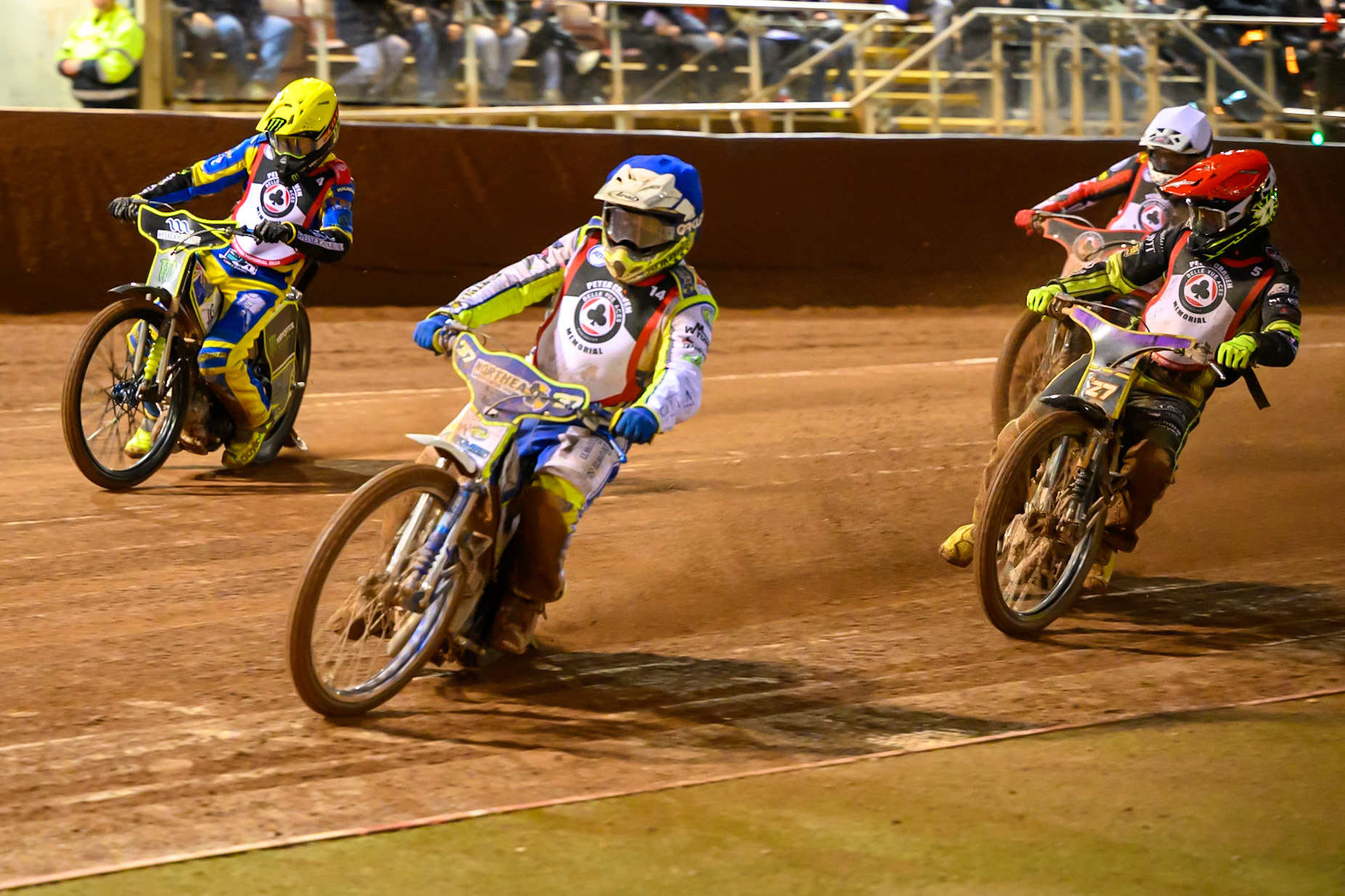 Chris Harris  in Blue leading Tom Brennan  in Red, Chris Holder  in Yellow and Zach Cook  in White during the Peter Craven Memorial Trophy at the National Speedway Stadium, Manchester, on Monday 16th March 2026. (Photo: Ian Charles | MI News)