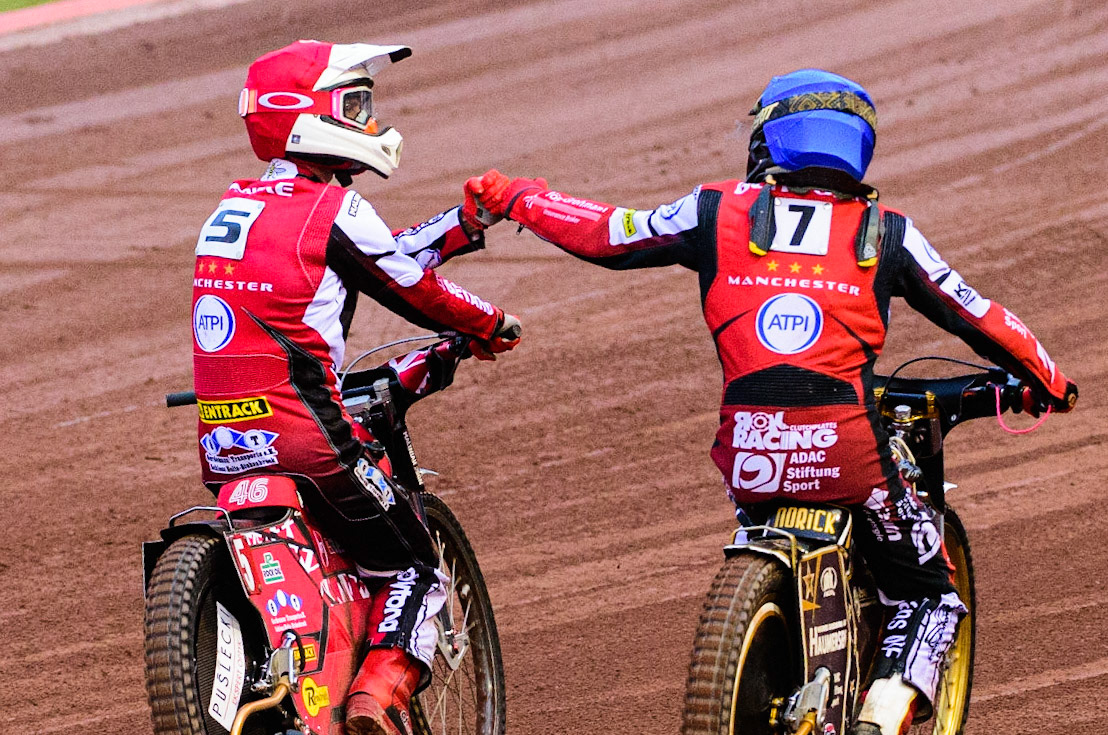 Max Fricke (Red) and Norick Blödorn  (Blue) celebrate their heat win during the SGB Premiership match between Belle Vue Aces and Peterborough at the National Speedway Stadium, Manchester on Monday 25th July 2022. (Credit: Ian Charles | MI News