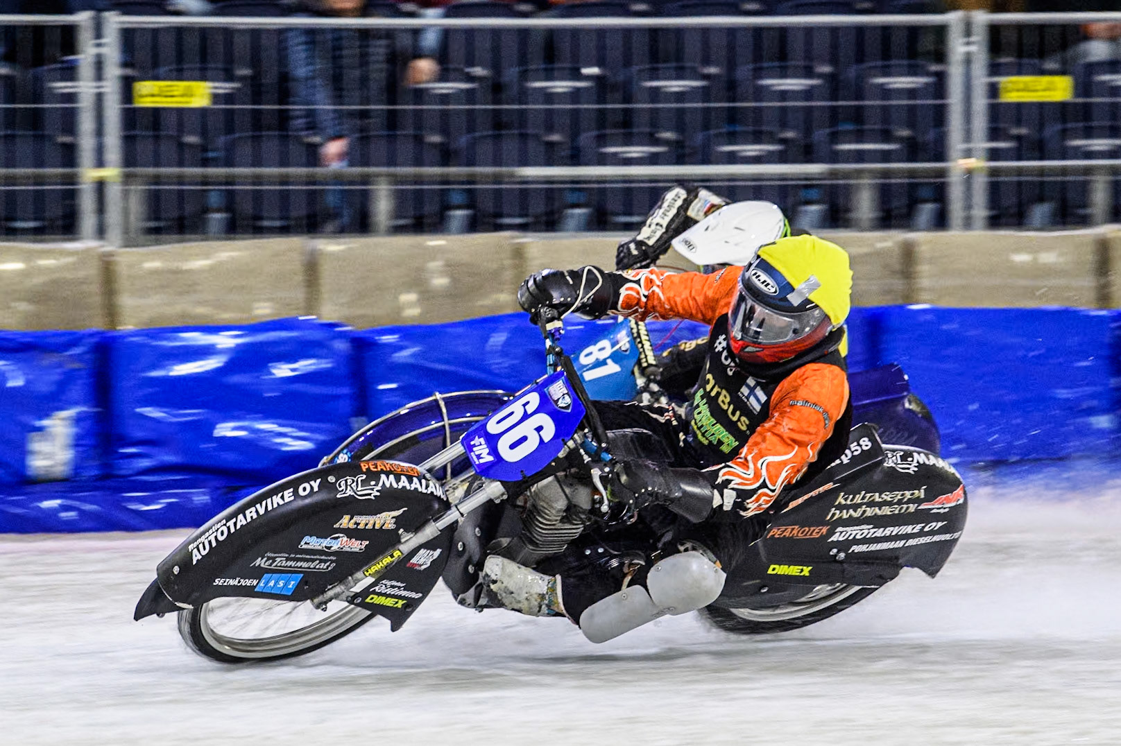 Finland's Aki Ala-Riihimäki (66) in Yellow rides inside Sweden"s Jimmy Olsén (81) in White during the FIM Ice Speedway Gladiators World Championship Final 3 at Ice Rink Thialf, Heerenveen on Saturday 6th April 2024. (Photo: Ian Charles | MI News)
