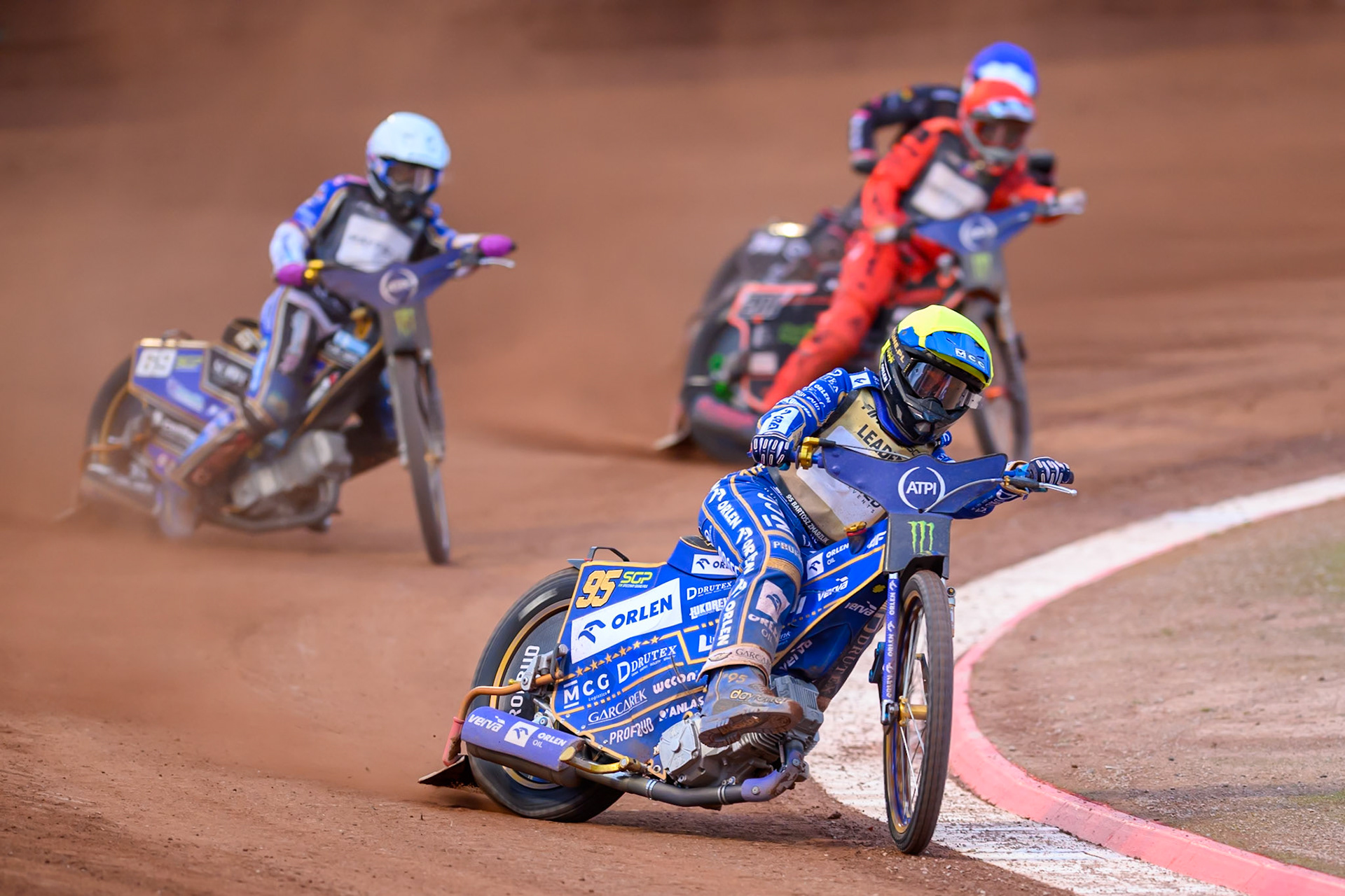 Bartosz Zmarzlik (95) of Poland in Yellow leading the last Chance Heat 2 ahead of Jason Doyle (69) of Australia in White Jan Kvech (201) of Czech Republic in Red and Kai Huckenbeck (744) of Germany in Blue during the ATPI  FIM Speedway GP of Manchester at the National Speedway Stadium, Manchester on Saturday 6th June 2026. (Photo: Ian Charles | MI News)