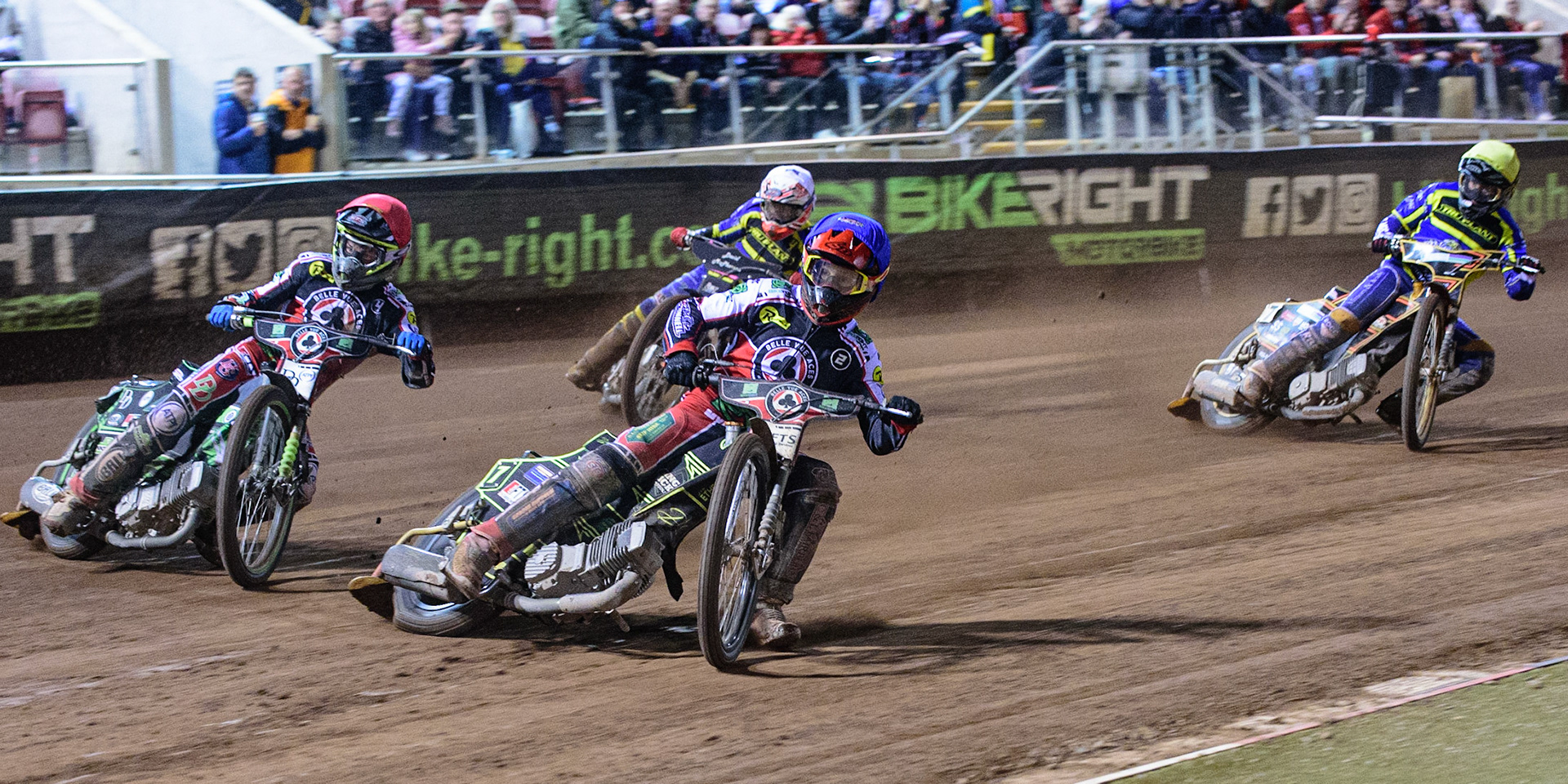 MANCHESTER, UK. OCT 7TH  Belle Vue BikeRight Aces  on maximum points as they try to win the meeting with Jye Etheridge   (Blue) and Charles Wright  (Red) ahead of Josh Pickering   (White) and Connor Mountain  (Yellow) during the SGB Premiership Play off Semi-Final Second Leg between Belle Vue Aces and Sheffield Tigers at the National Speedway Stadium, Manchester on Thursday 7th October 2021. (Credit: Ian Charles | MI News)