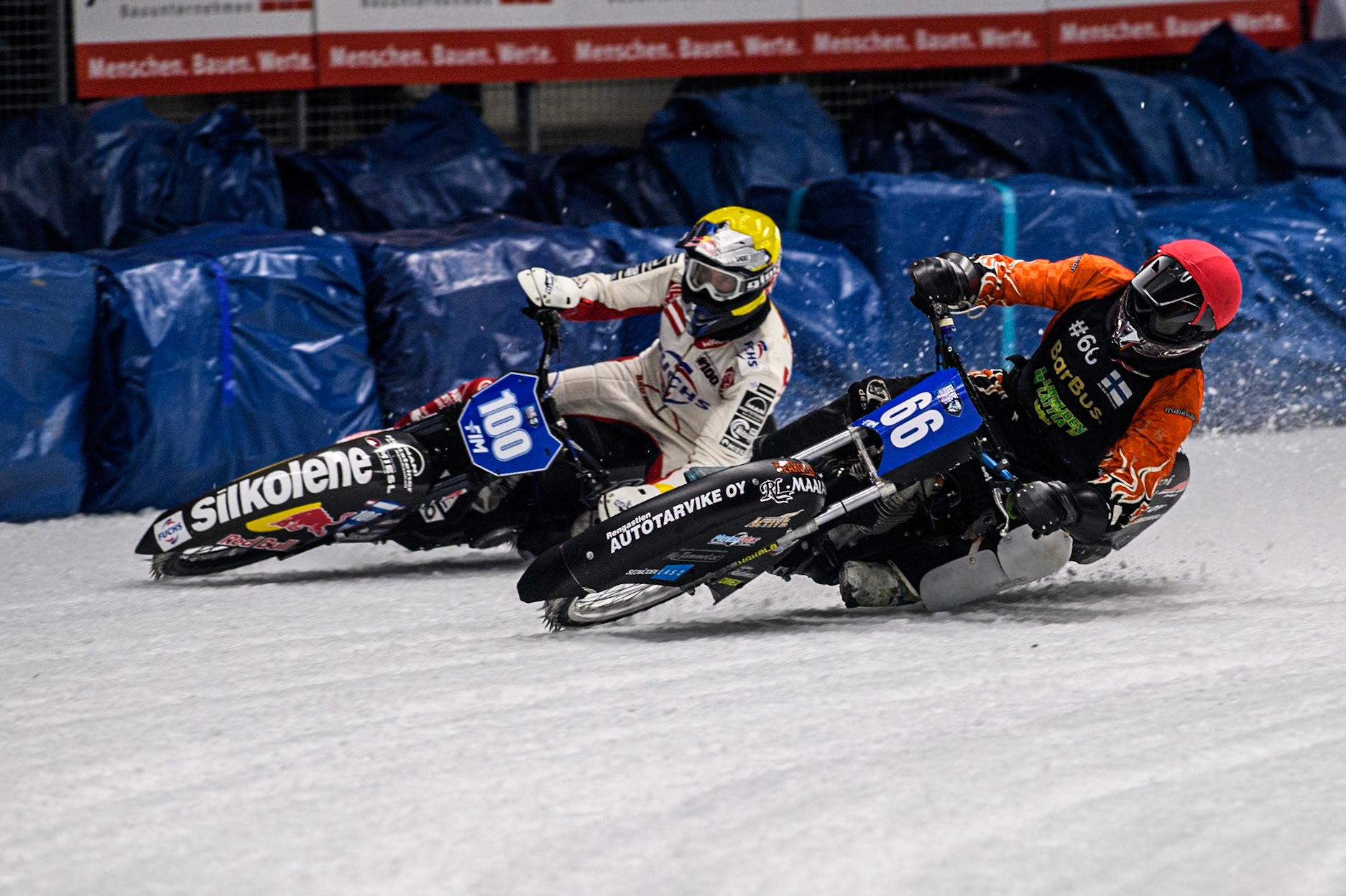 Finland's Aki Ala-Riihimäki (66) (Red) inside Austria's Franz Zorn (100) (Yellow) during the FIM Ice Speedway Gladiators World Championship Final 1 at the Max-Aicher-Arena, Inzell on Saturday 23 March 2024. (Photo: Ian Charles | MI News)
