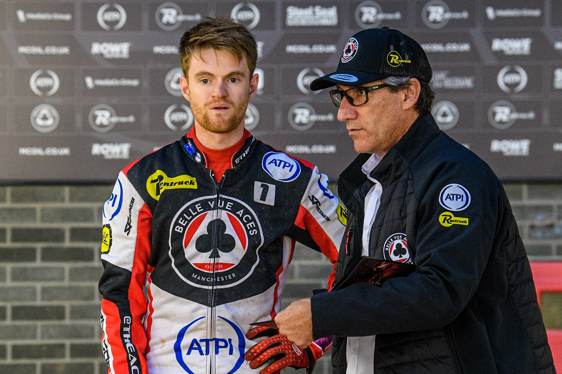 Belle Vue Aces' Brady Kurtz  (L to R) with Belle Vue Aces' Team Manager Mark Lemon  during the Rowe Motor Oil Premiership match between Belle Vue Aces and Oxford Spires at the National Speedway Stadium, Manchester on Monday 22nd July 2024. (Photo: Ian Charles | MI News)