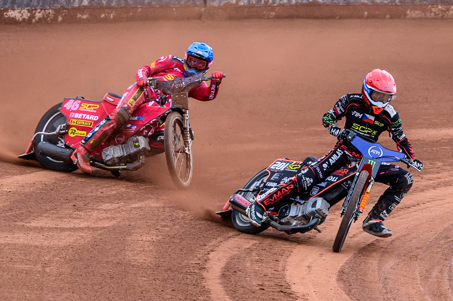 January Kvech (201) of Czech Republic in Red leading Max Fricke (46) of Australia in Blue during the ATPI FIM Speedway Grand Prix Round 4 at the National Speedway Stadium, Manchester, on Friday 13th June 2025. (Photo: Ian Charles | MI News)