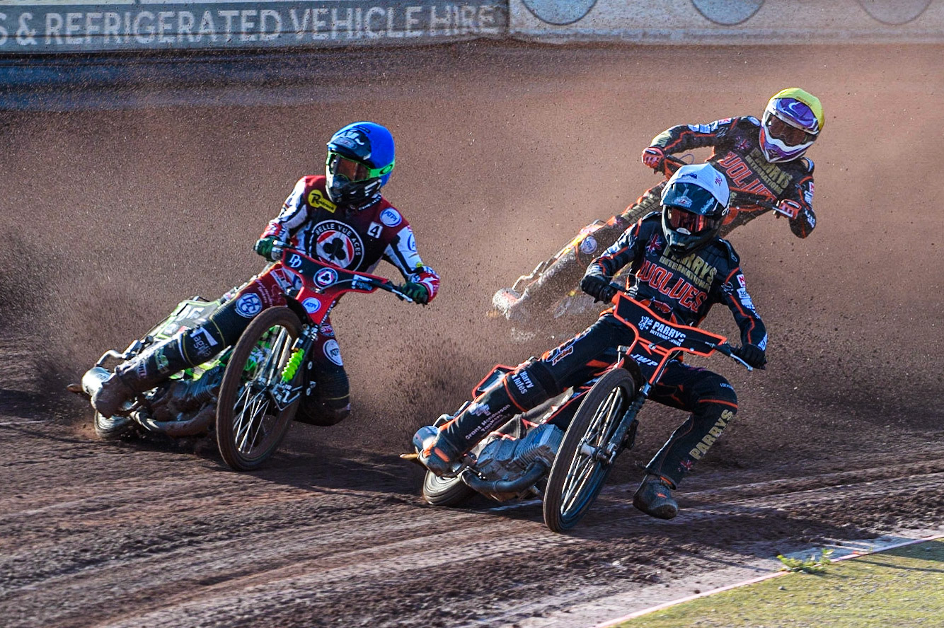 Sam Masters (White) inside Charles Wright (Blue) with Rory Schlein (Yellow) behind during the Sports Insure Premiership match between Belle Vue Aces and Wolverhampton Wolves at the National Speedway Stadium, Manchester on Monday 3rd July 2023. (Photo: Ian Charles | MI News)