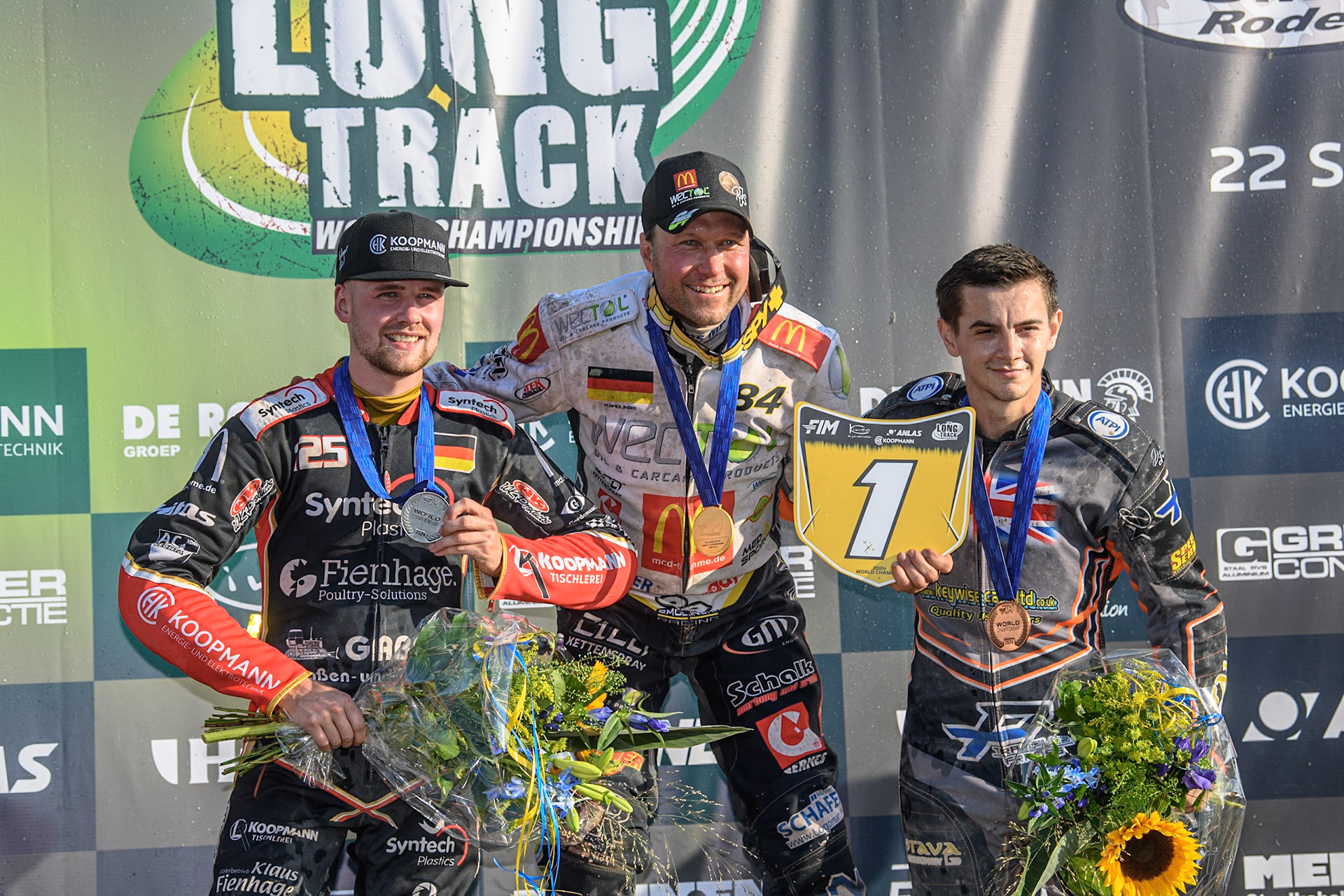 World Championship Top 3: (L to R) Lukas Fienhage (125) of Germany (2nd), Martin Smolinski (84) of Germany (World Champion), Zach Wajtknecht (109) of Great Britain (Third) during the FIM Long Track World Championship Final 5 at the Speed Centre Roden, Roden, Netherlands on Sunday 22nd September 2024. (Photo: Ian Charles | MI News)