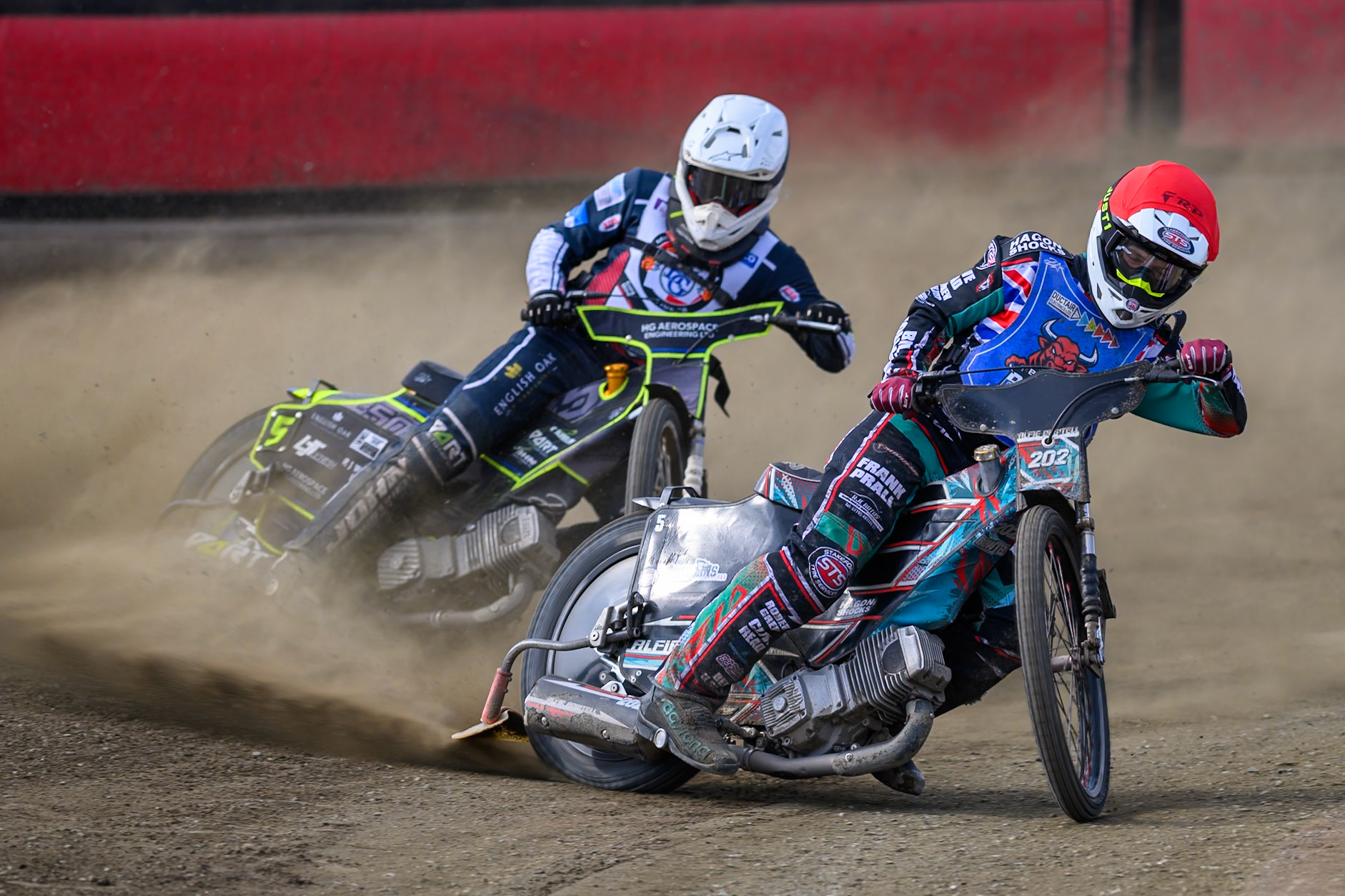 Alfie Bowtell of Buxton Bulls in Red leading Nathan Ablitt of Middlesborough Tigers in White during the WSRA National Development League match  between Buxton Bulls and Middlesborough Tigers at Hi-Edge Speedway, Buxton on Sunday 16th August 2026. (Photo: Ian Charles | MI News)